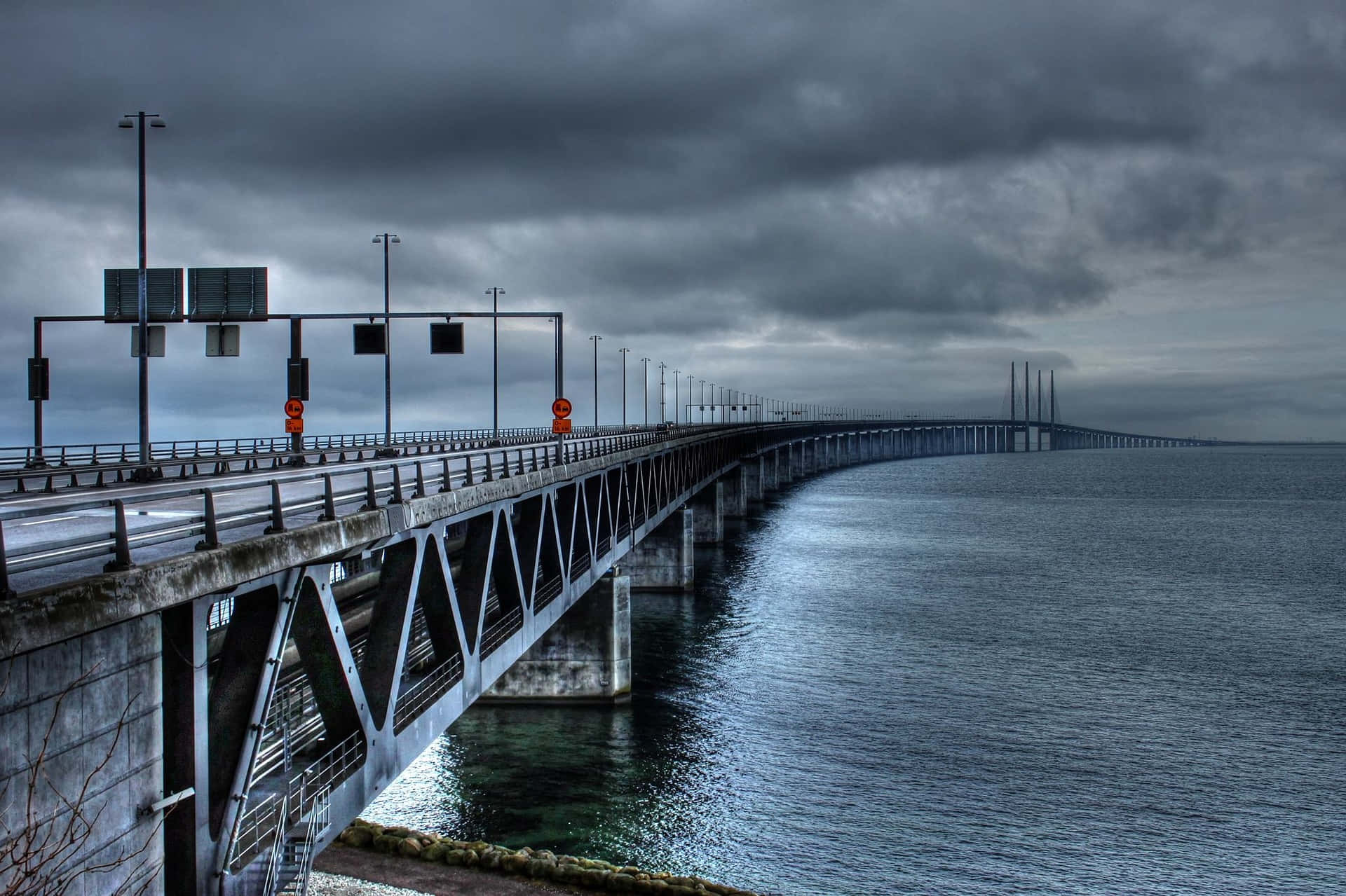 Oresund Bridge, dark water, heavy gray storm cloud sky, Full HD Desktop Wallpaper