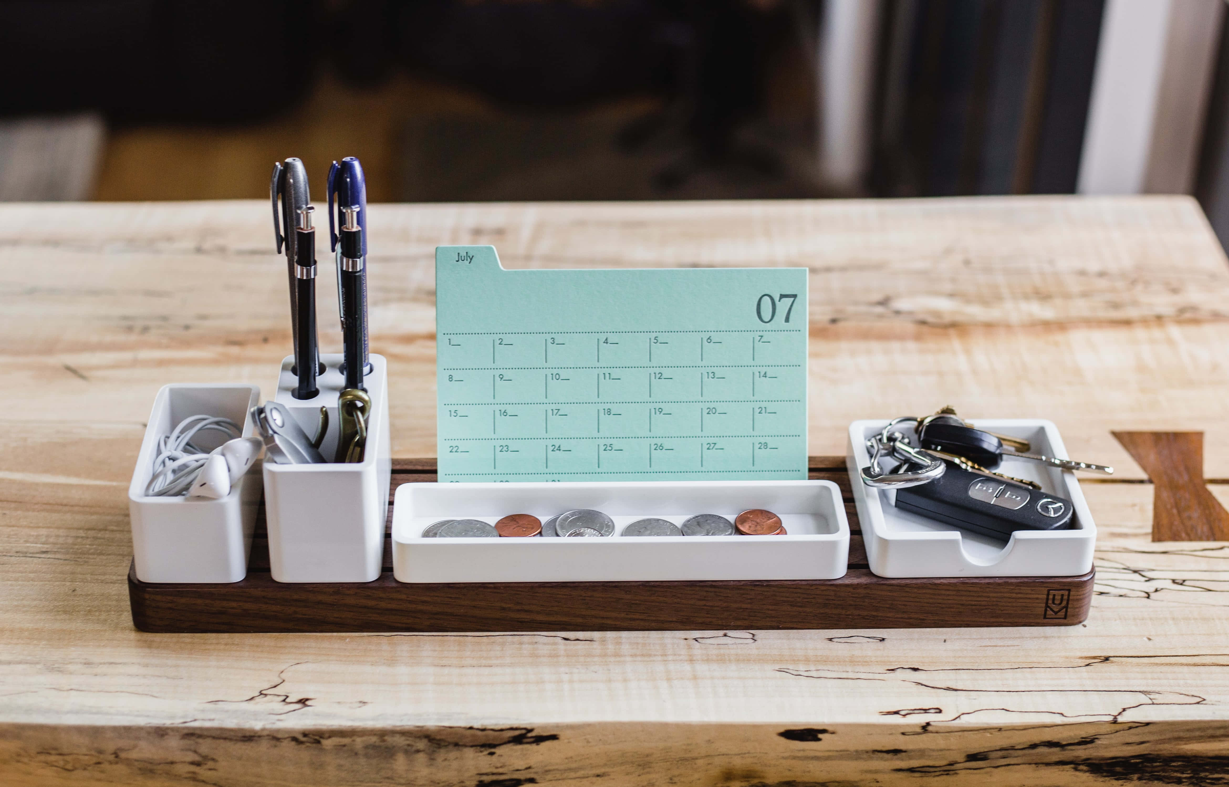 minimalist wooden desk organizer, light wood surface, July calendar, 4K Desktop Wallpaper