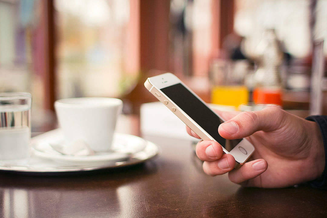 Original iPhone 5, white smartphone, wooden table, SD Desktop Wallpaper