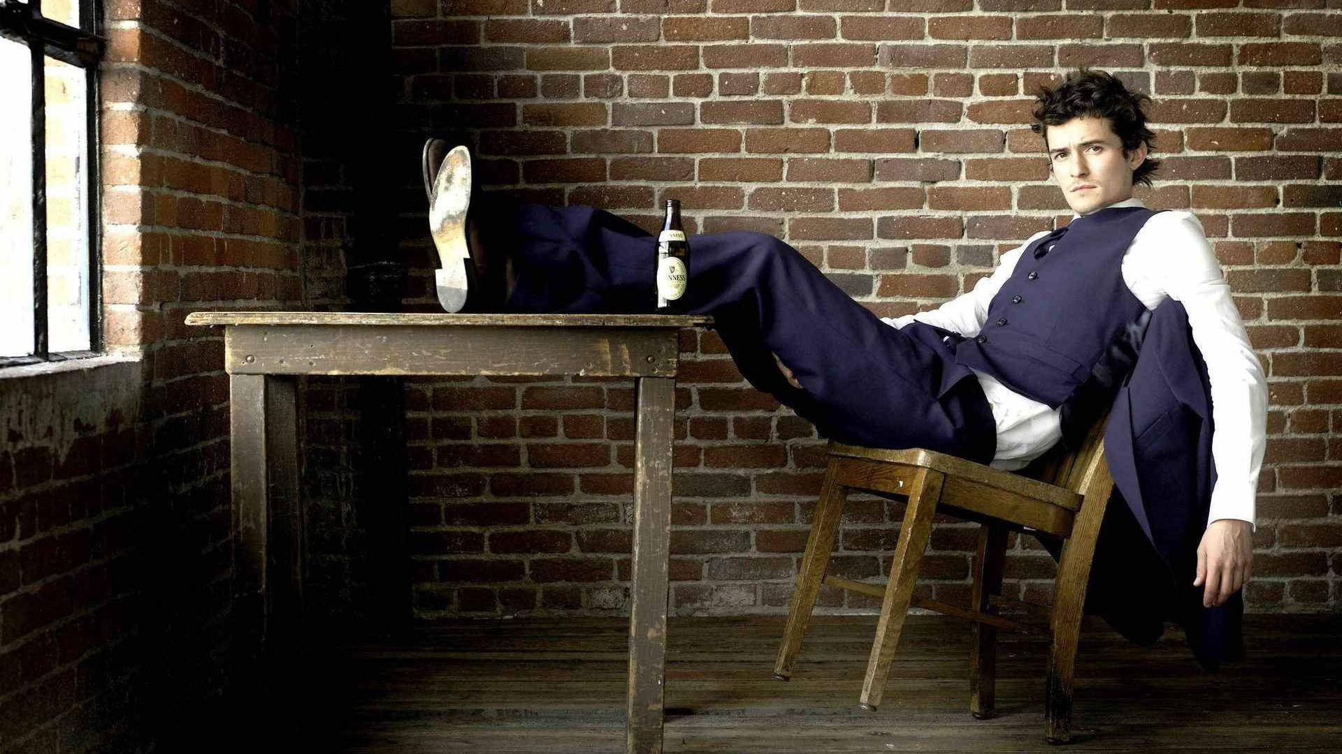 Orlando Bloom, vest, wooden chair, Full HD Desktop Wallpaper