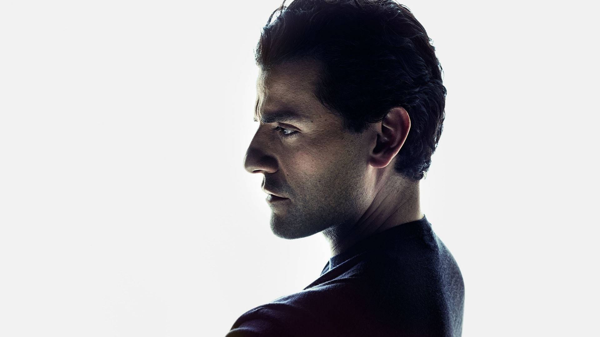 Oscar Isaac, side view, dramatic side lighting, Full HD Desktop Wallpaper