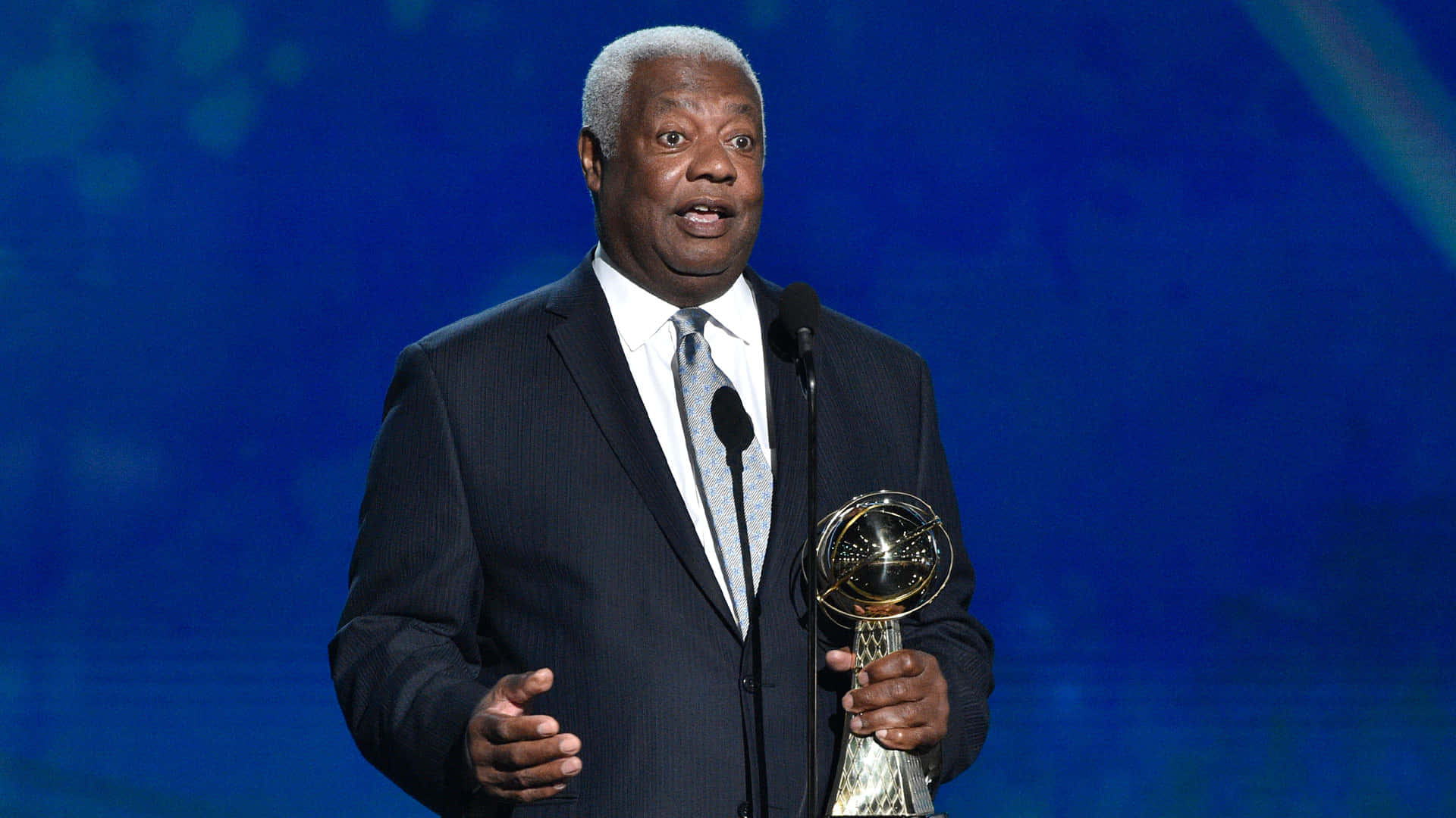 Oscar Robertson, golden trophy, dark suit, Full HD Desktop Wallpaper
