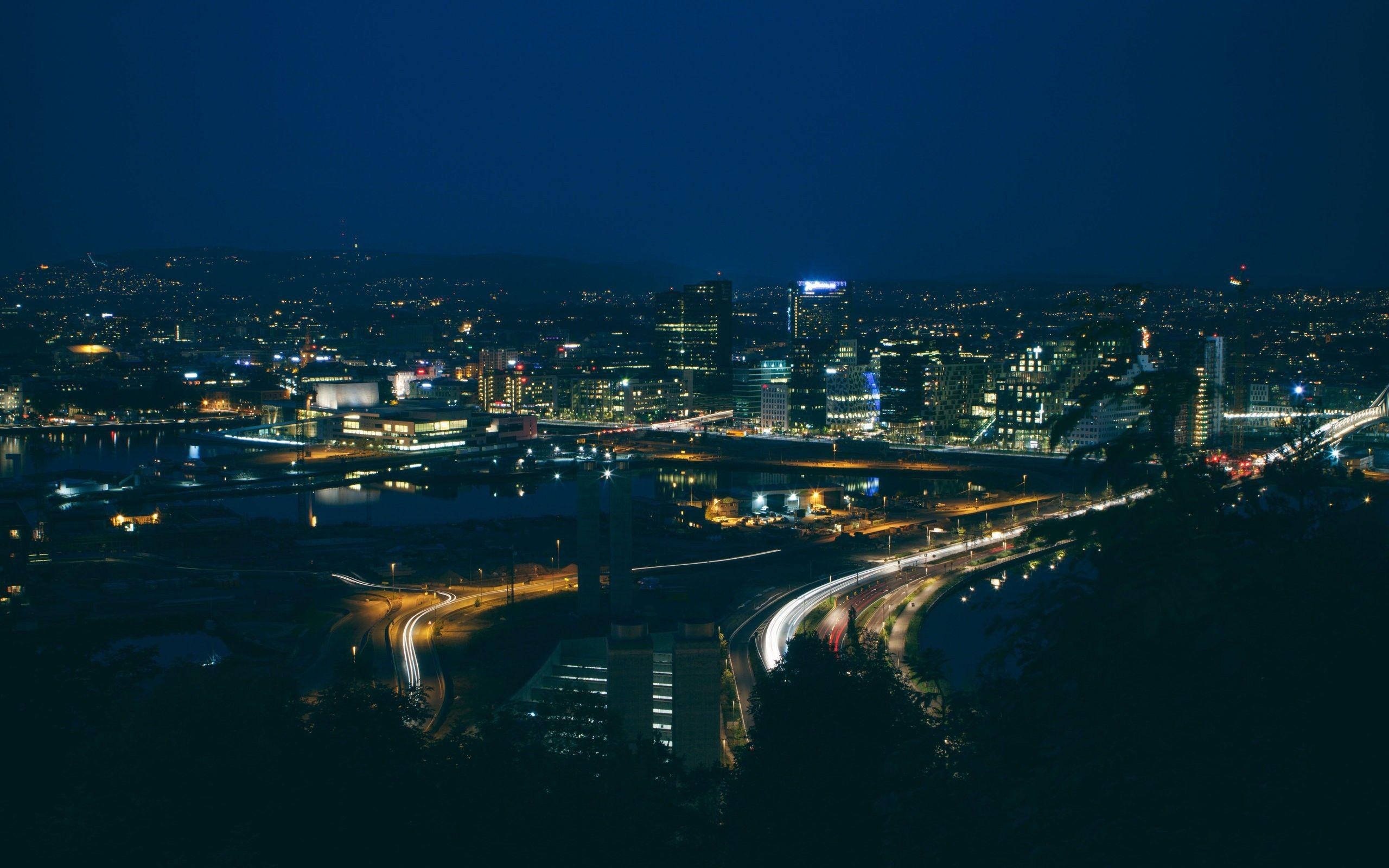 Oslo, Night Cityscape, glowing skyscrapers, 2K Desktop Wallpaper