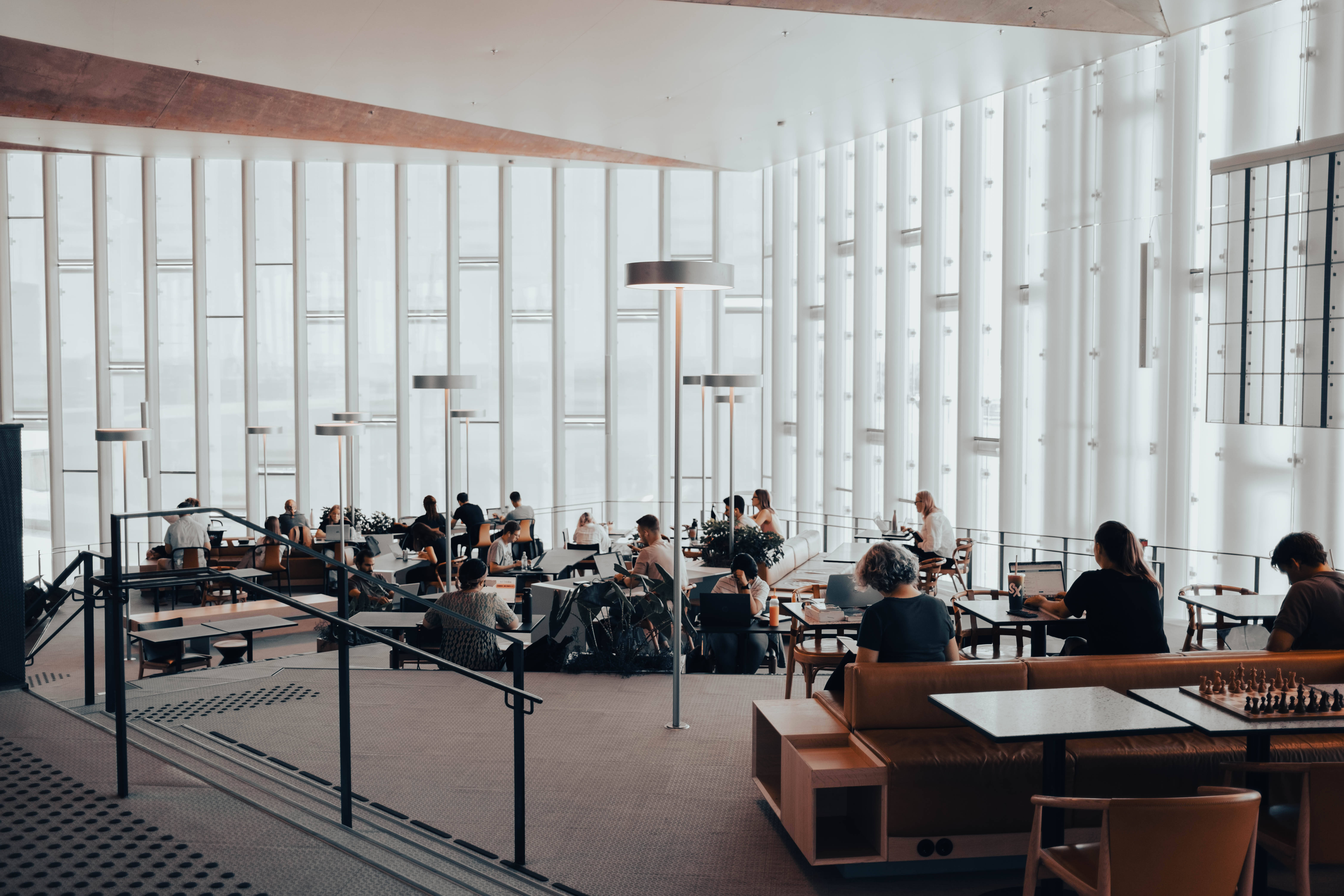 Oslo, modern bright interior, people working at tables, 5K Desktop Wallpaper