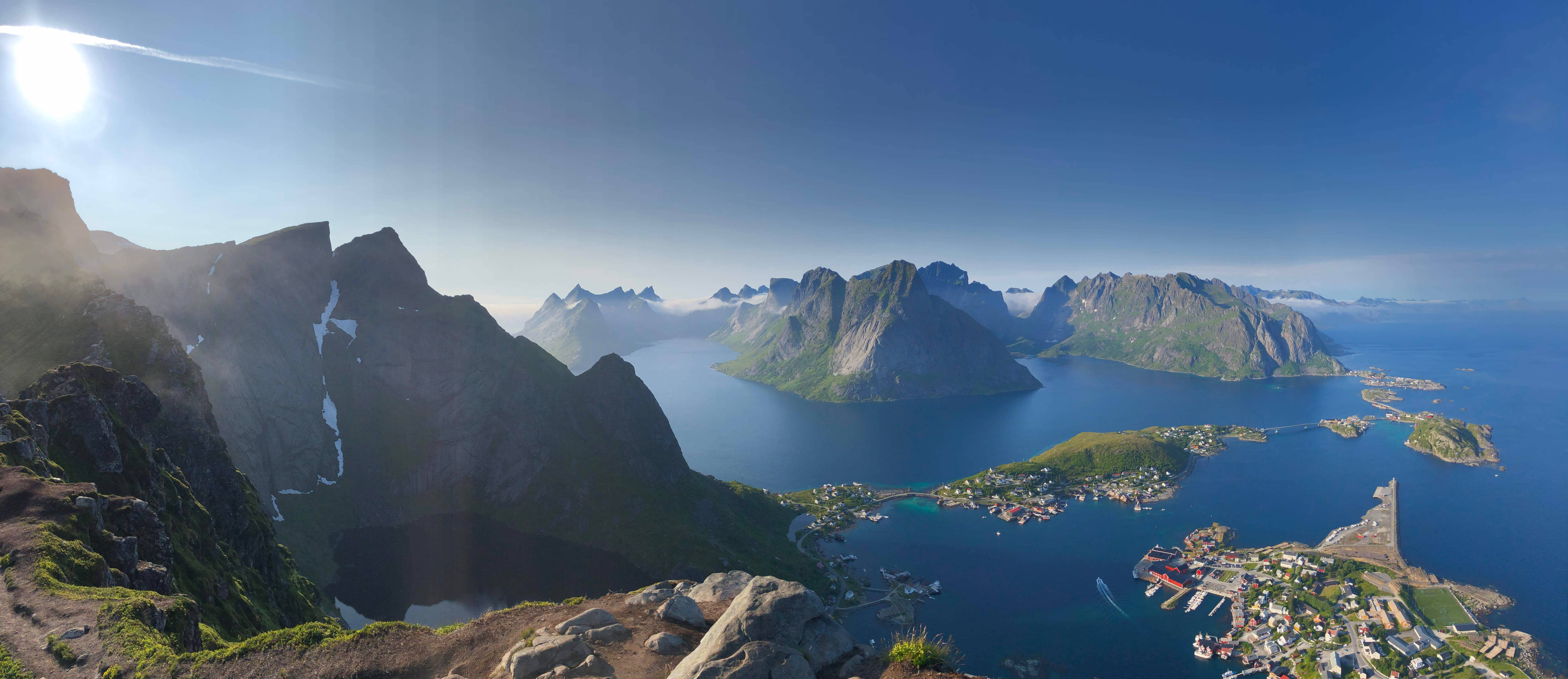 Oslo, rugged mountain peaks, deep blue fjords, 8K Desktop Wallpaper
