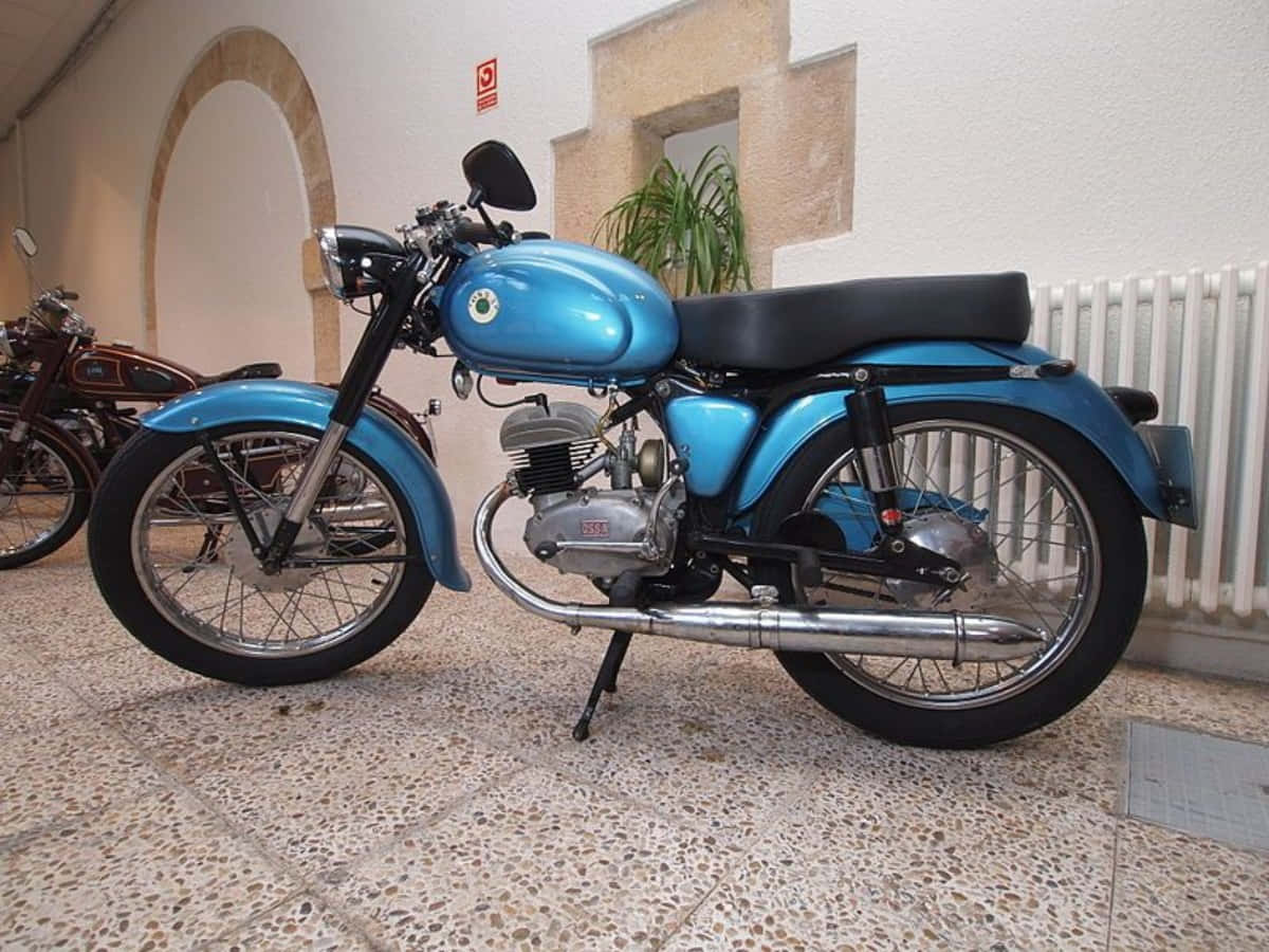 Ossa Motorcycle, vintage blue motorcycle, chrome accents, SD Desktop Wallpaper