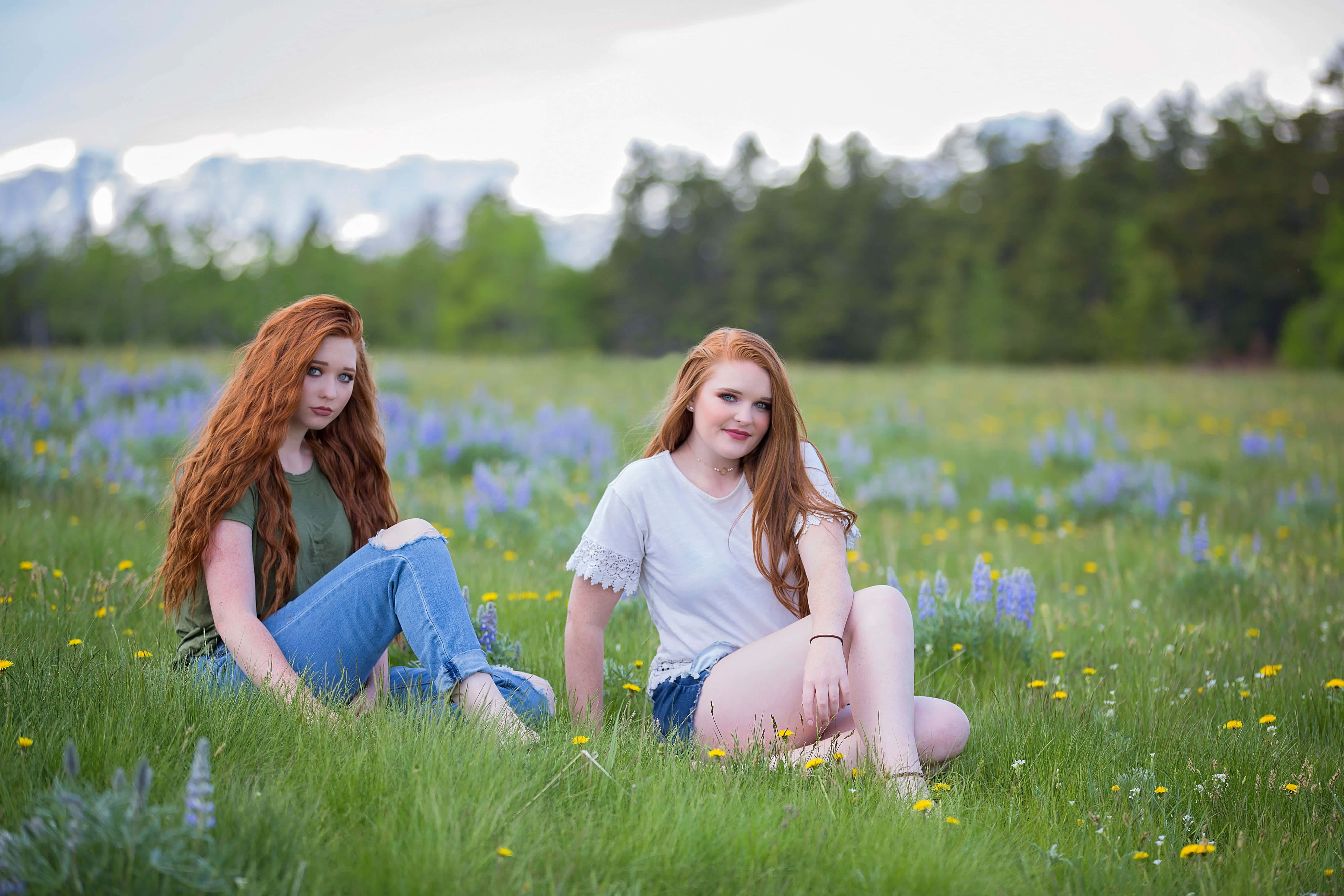 red-haired women, sunlit meadow, purple and yellow wildflowers, 5K Desktop Wallpaper