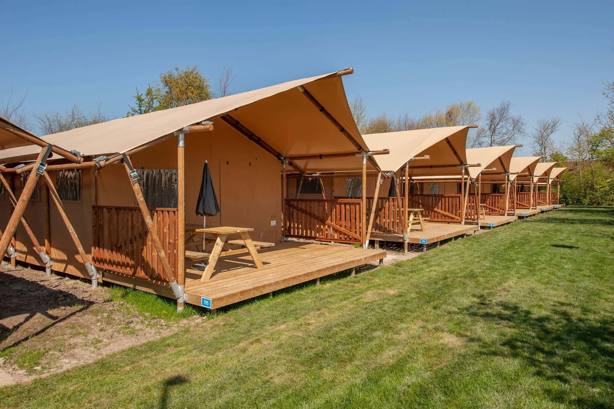 tan canvas glamping tents, wooden decks, picnic tables, Full HD Desktop Wallpaper