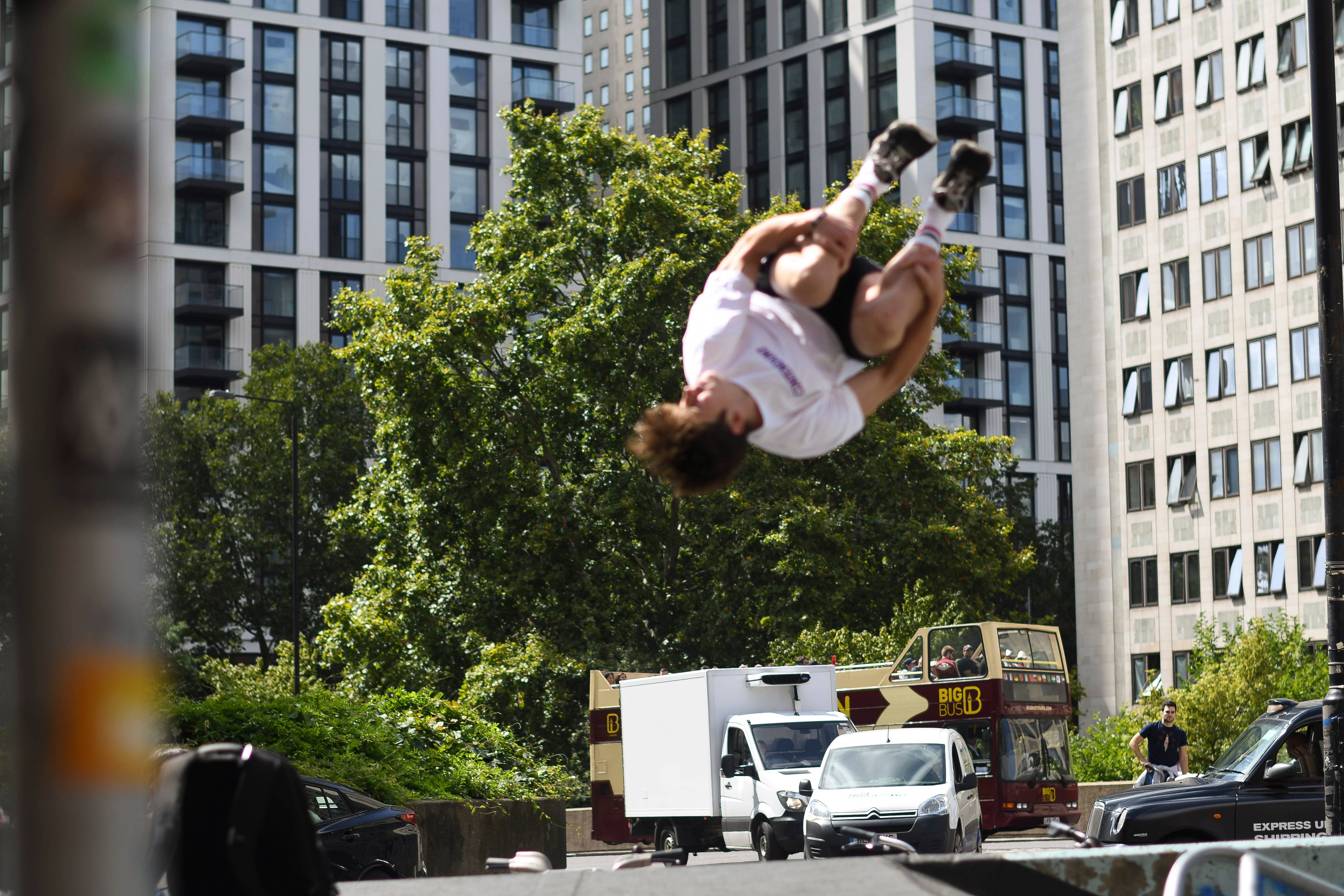 skateboarder, backflip, sunlit urban street, 5K Desktop Wallpaper
