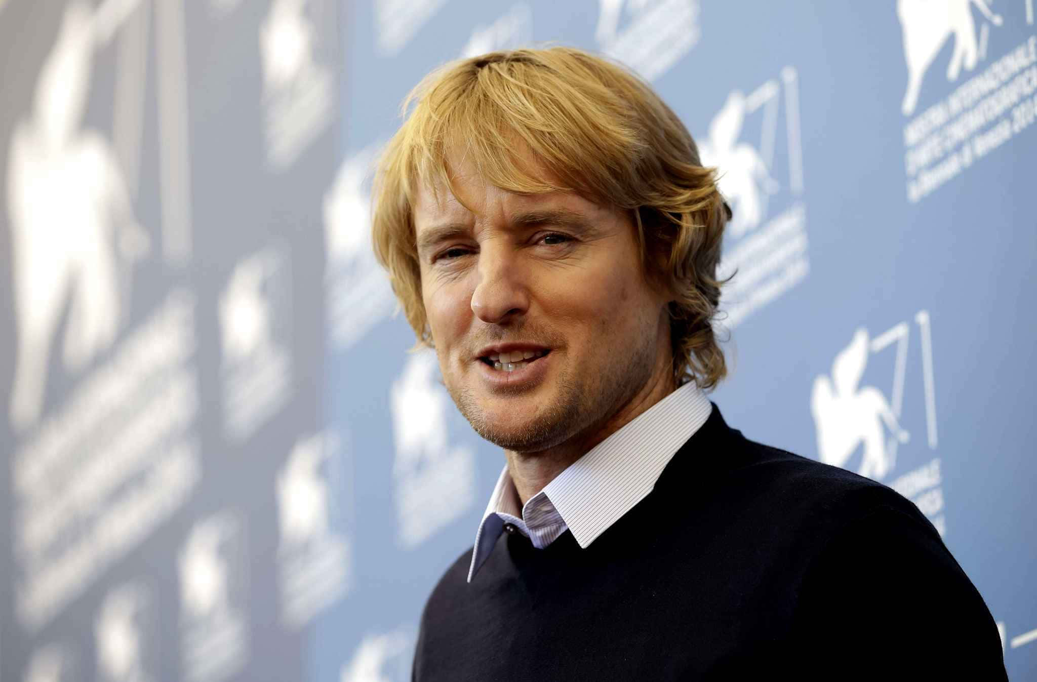 Owen Wilson, blue backdrop, white logos, Full HD Desktop Wallpaper