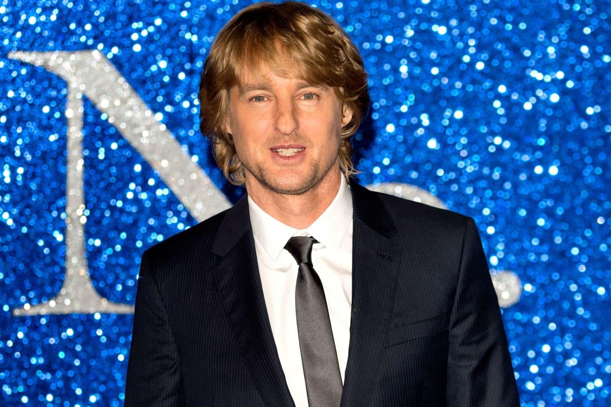 Owen Wilson, dark suit and tie, sparkling blue sequined backdrop, Full HD Desktop Wallpaper