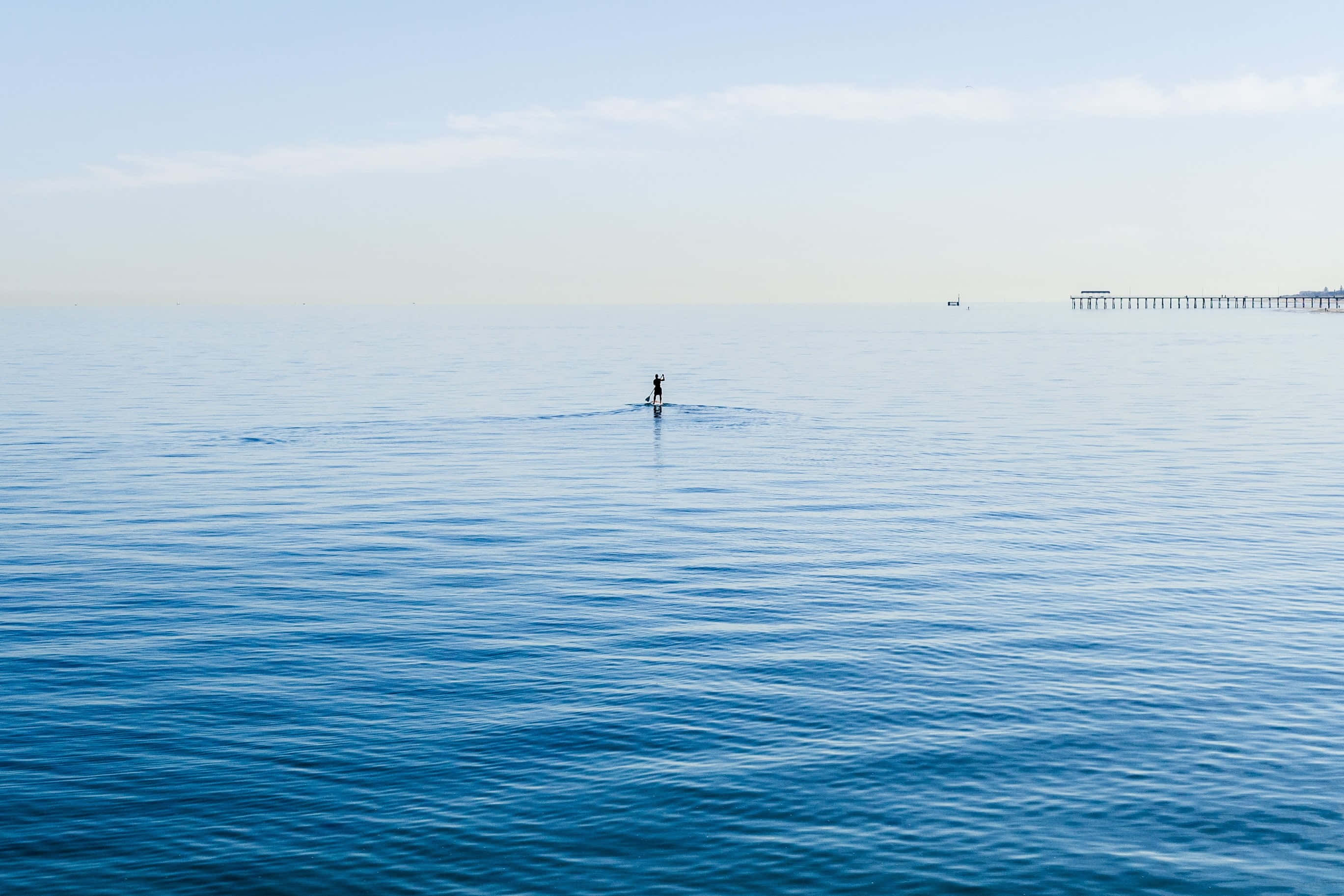paddleboarding, hydrofoil board, calm blue waters, 2K Desktop Wallpaper