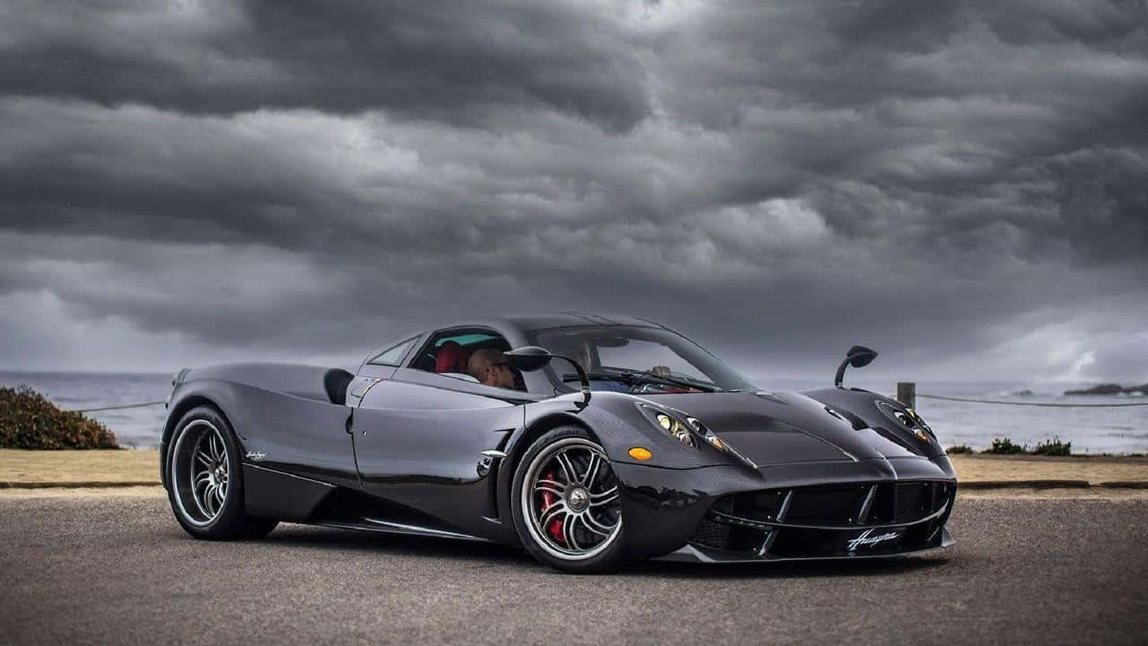 Pagani Huayra BC, coastal road, stormy sky, HD Desktop Wallpaper