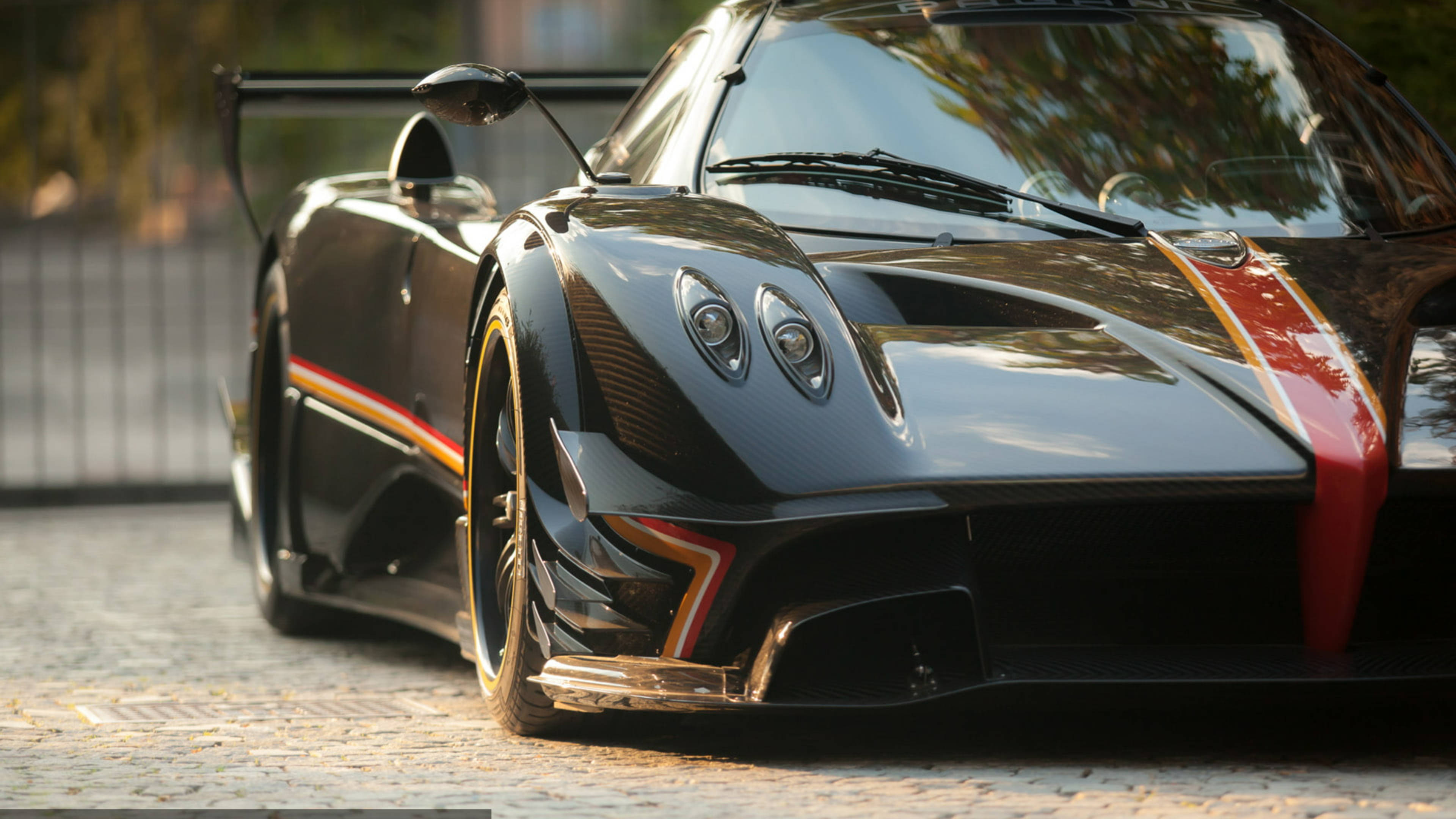 Pagani Huayra, sleek black, red and gold accents, 4K Desktop Wallpaper