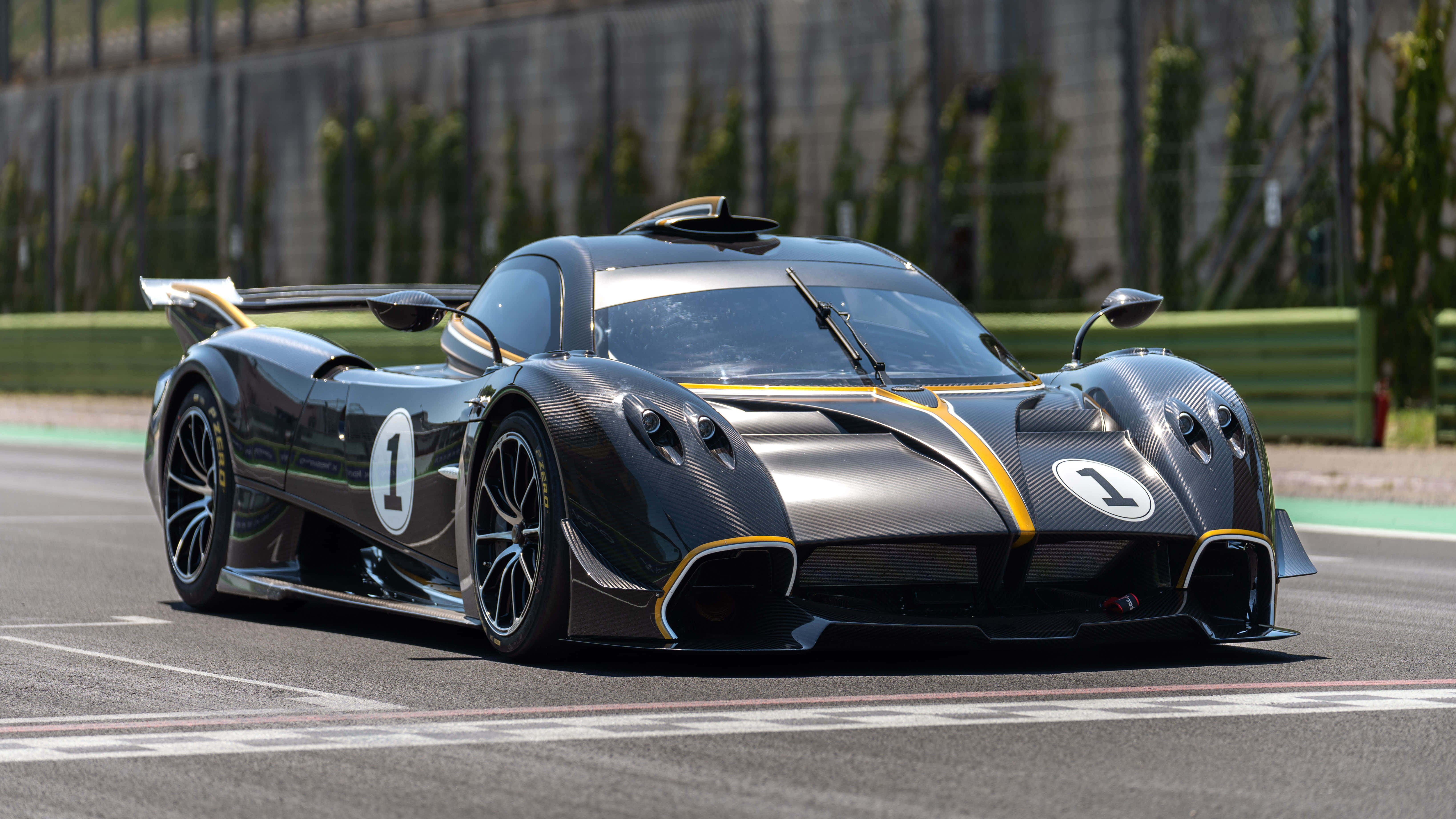 Pagani Huayra, black carbon fiber, yellow accents, 5K Desktop Wallpaper