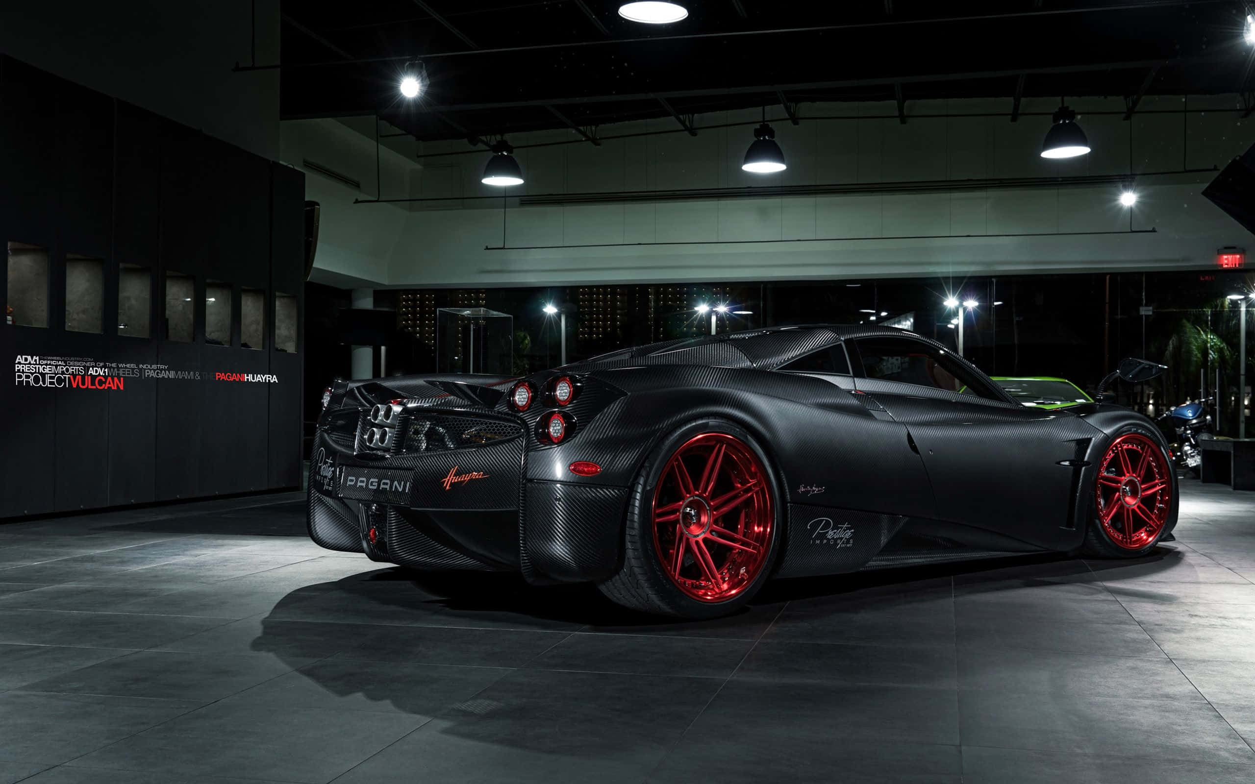 Pagani Huayra BC, matte black, vibrant red wheels, 2K Desktop Wallpaper