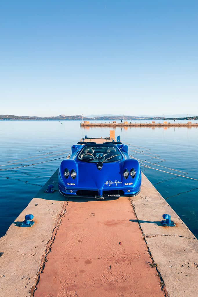 Pagani Zonda C12 Roadster, vibrant blue, weathered dock, SD Phone Wallpaper