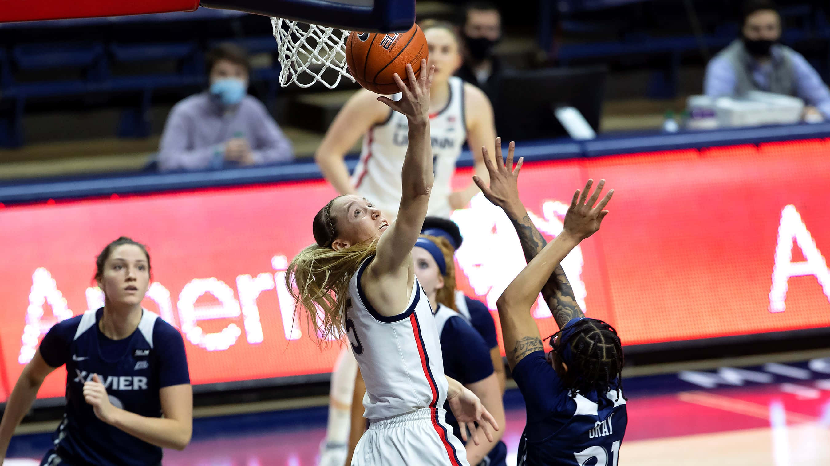 Paige Bueckers, white uniform, blue jerseys, 2K Desktop Wallpaper
