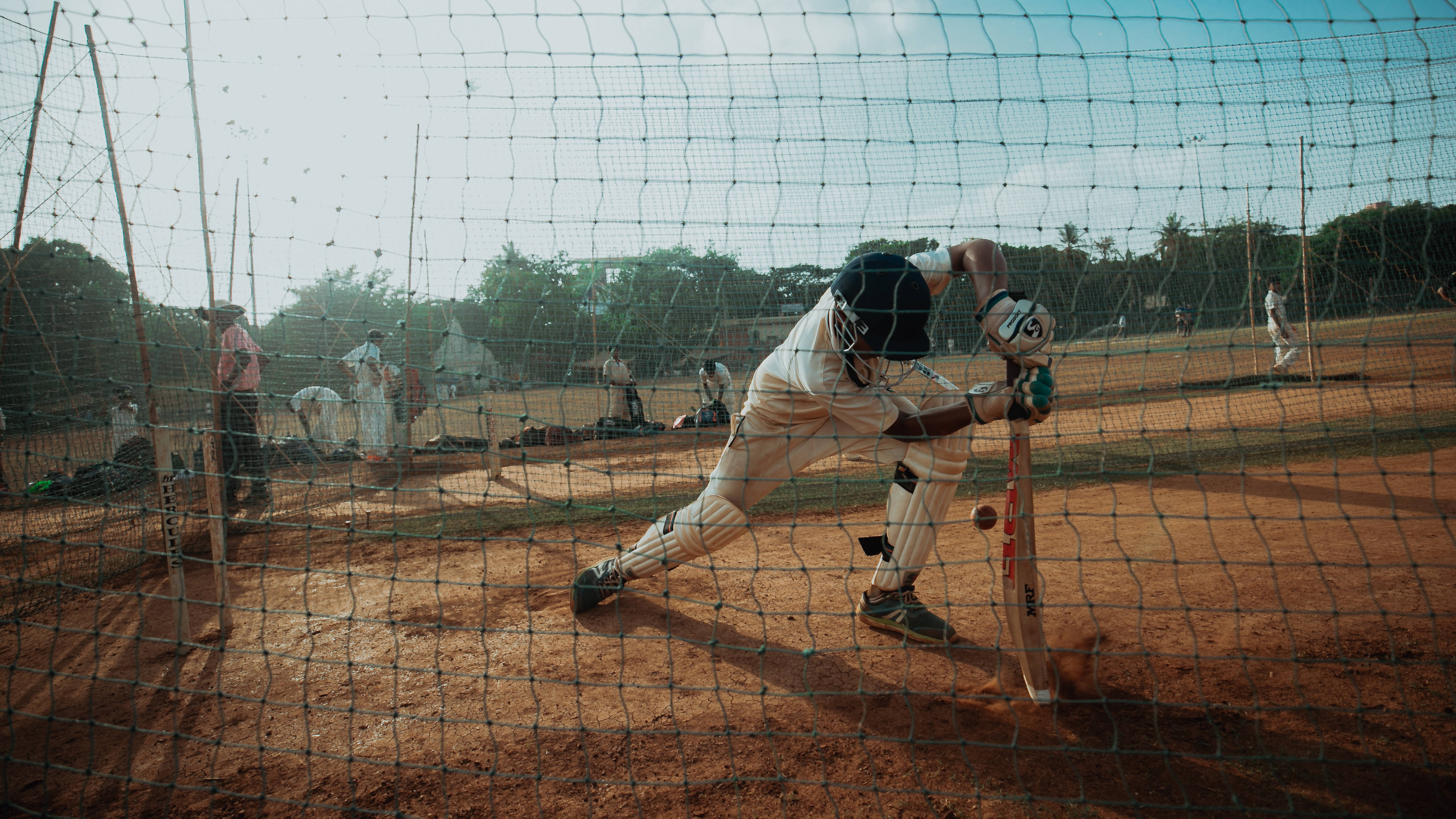 cricket batsman, white gear, netted practice area, 4K Desktop Wallpaper