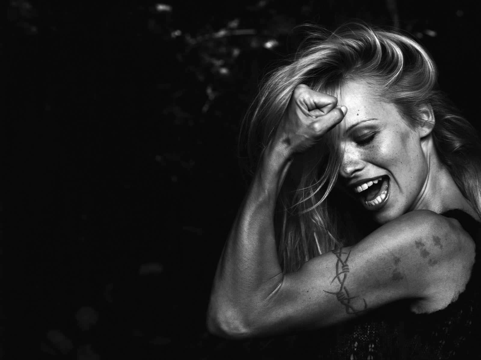 Pamela Anderson, black and white portrait, laughing joyfully, HD Desktop Wallpaper