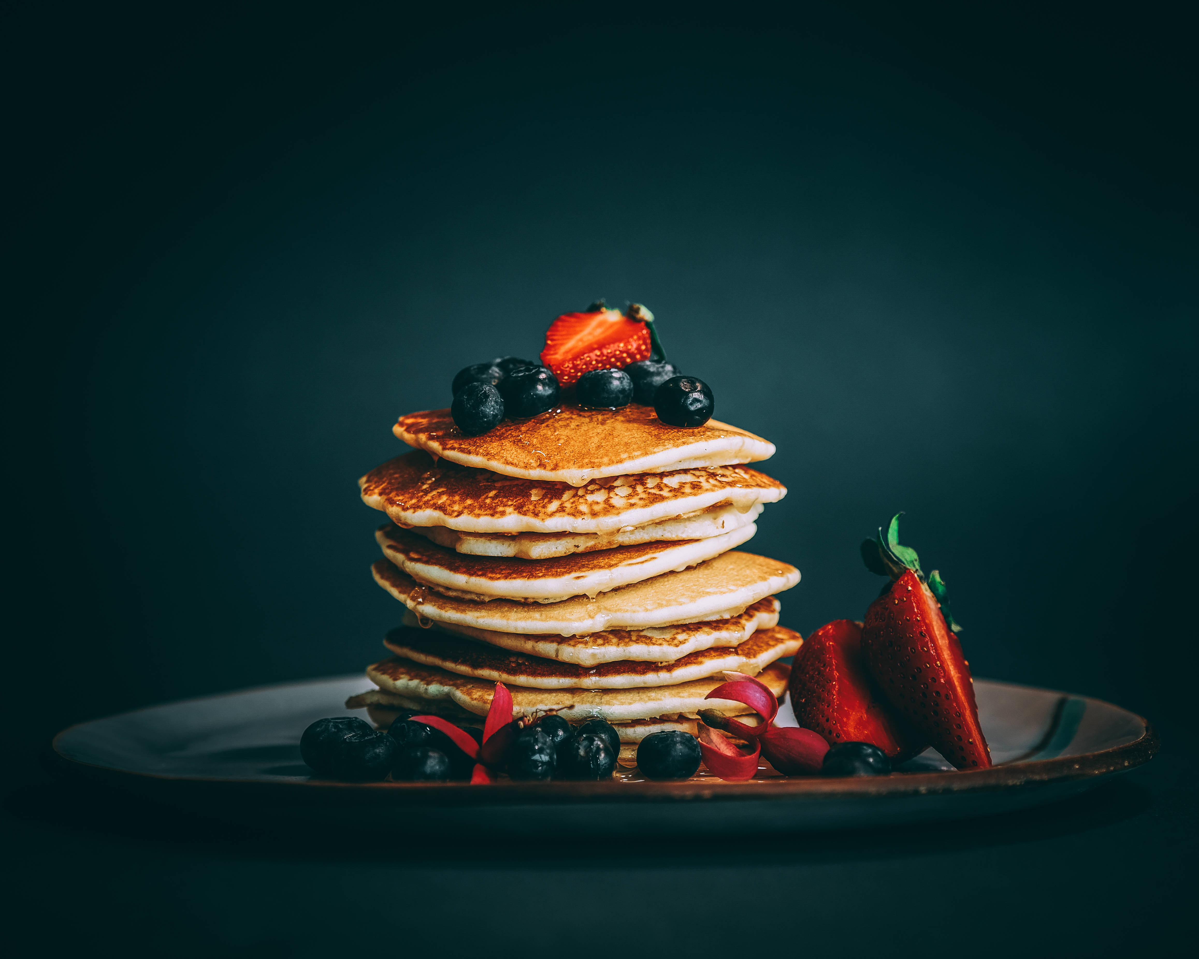 stack of golden pancakes, fresh berries, dark plate, 4K Desktop Wallpaper