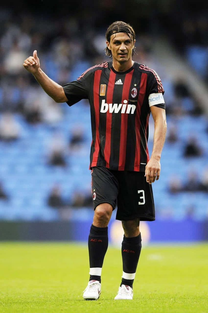 Paolo Maldini, red and black striped jersey, green pitch, SD Phone Wallpaper