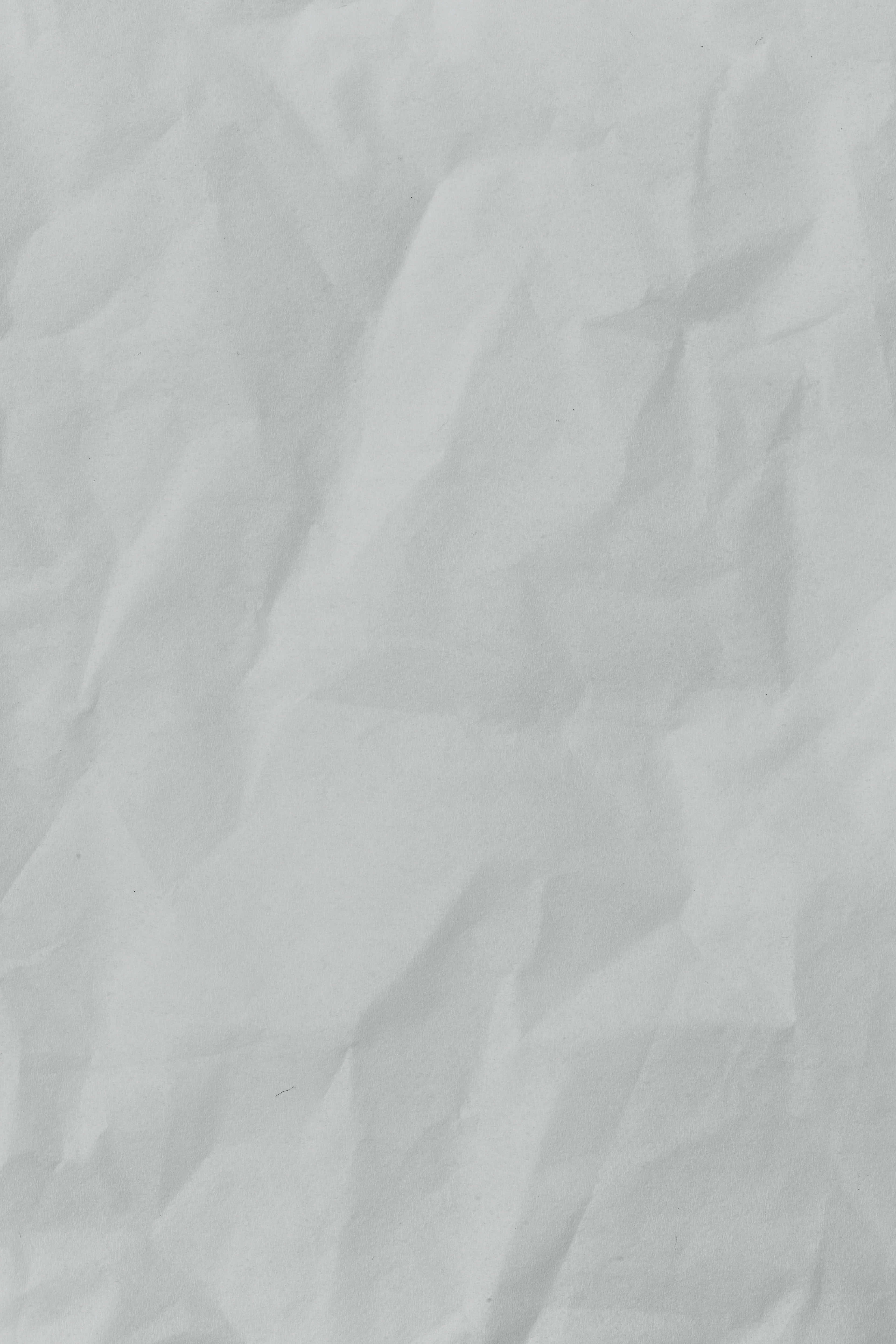 crumpled paper texture, white paper, soft shadows, 5K Phone Wallpaper