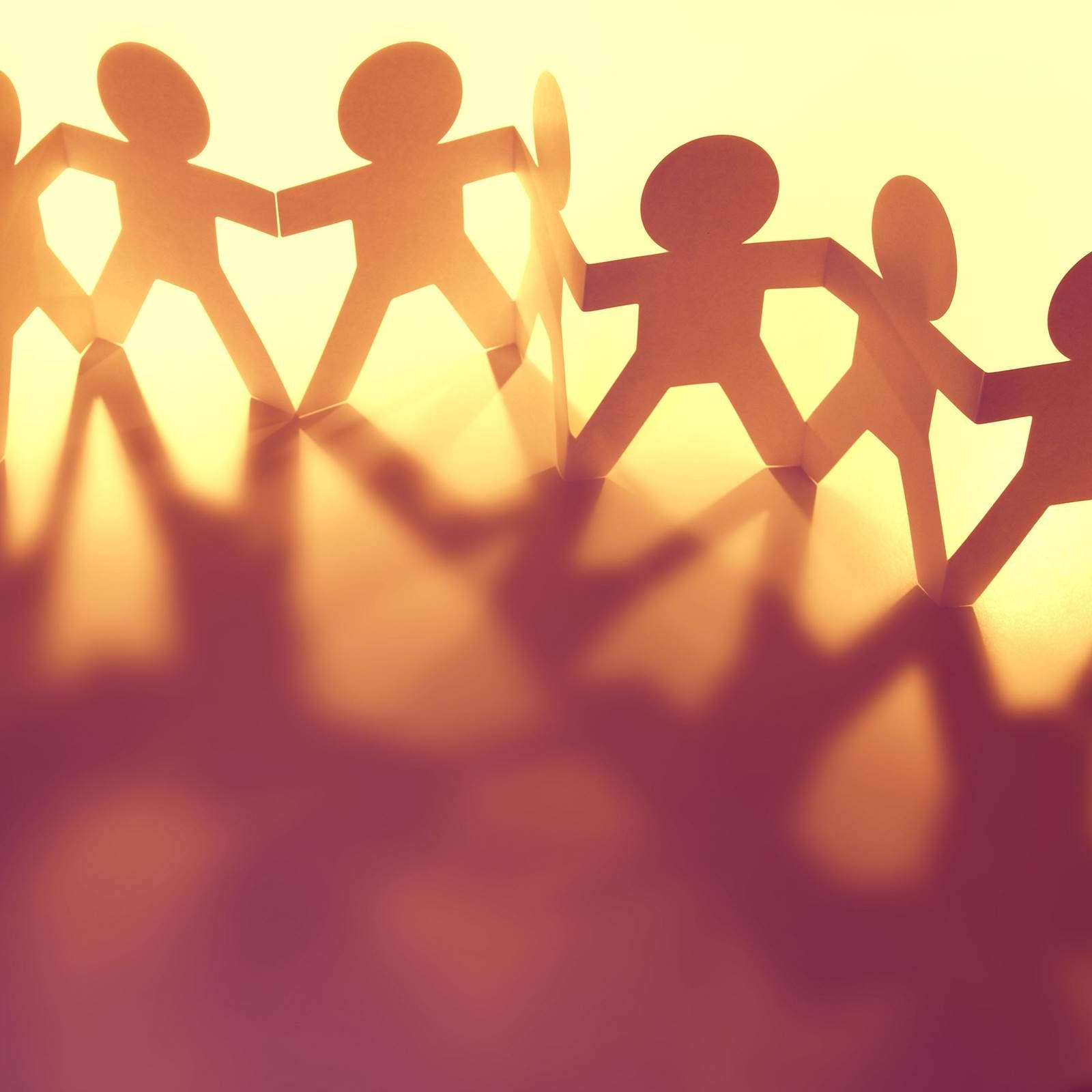 Paper cutout figures, holding hands, warm glowing chain, HD Desktop Wallpaper
