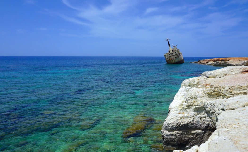 Paphos Beach, crystal clear turquoise waters, sunlit shipwreck, SD Desktop Wallpaper