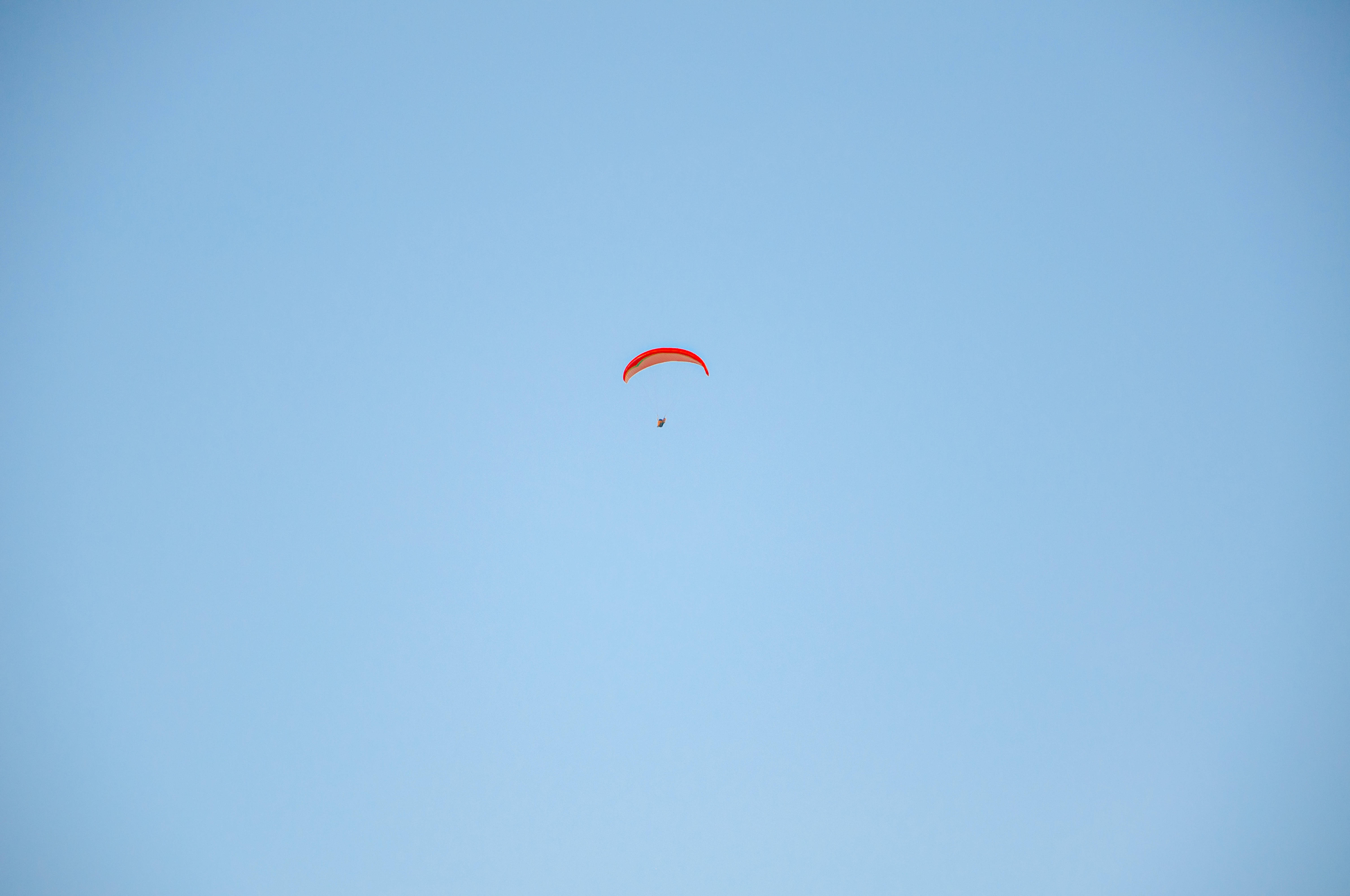 paragliding, red wing, vibrant red, 5K Desktop Wallpaper