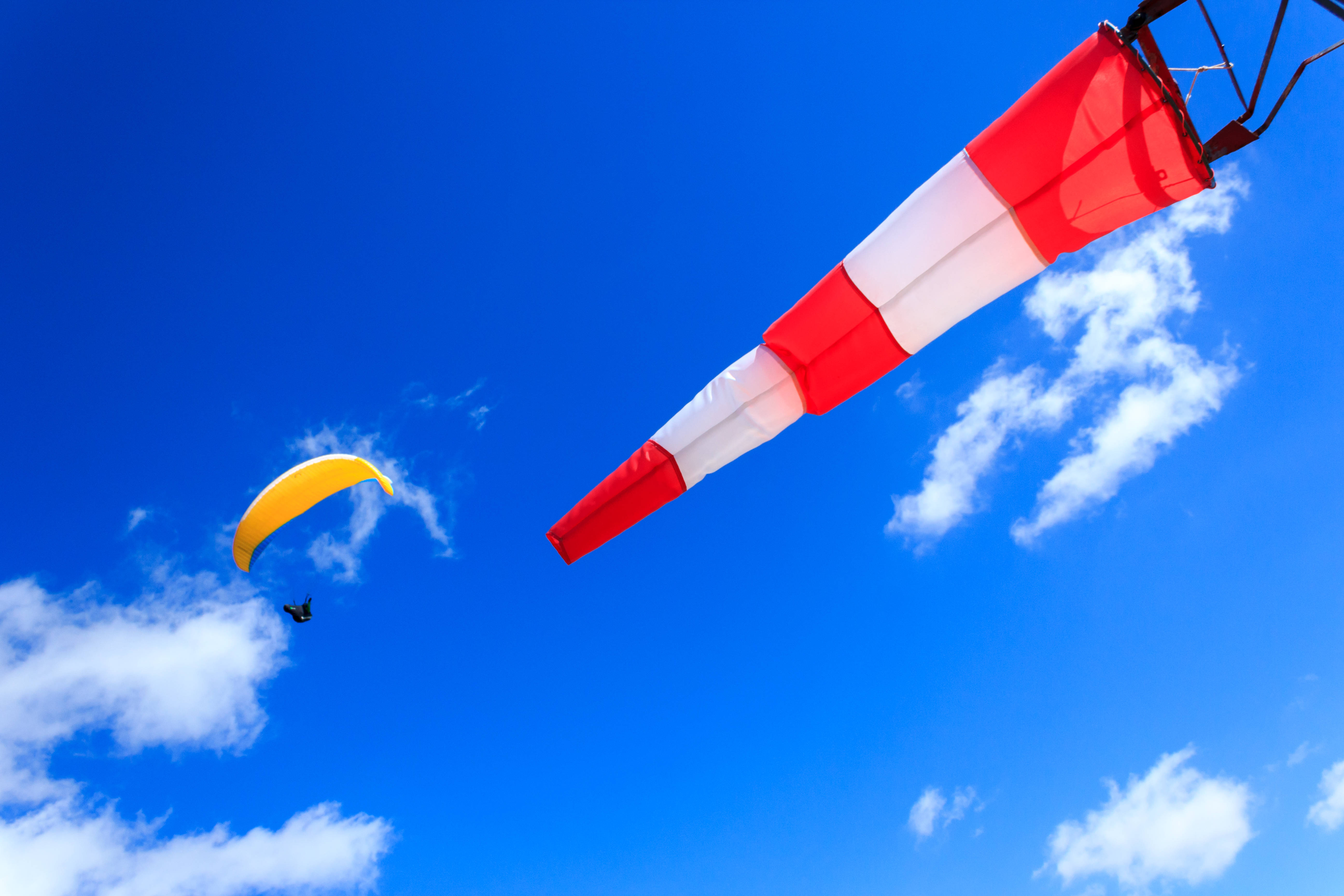 paragliding, wind indicator flag, yellow paraglider, 5K Desktop Wallpaper