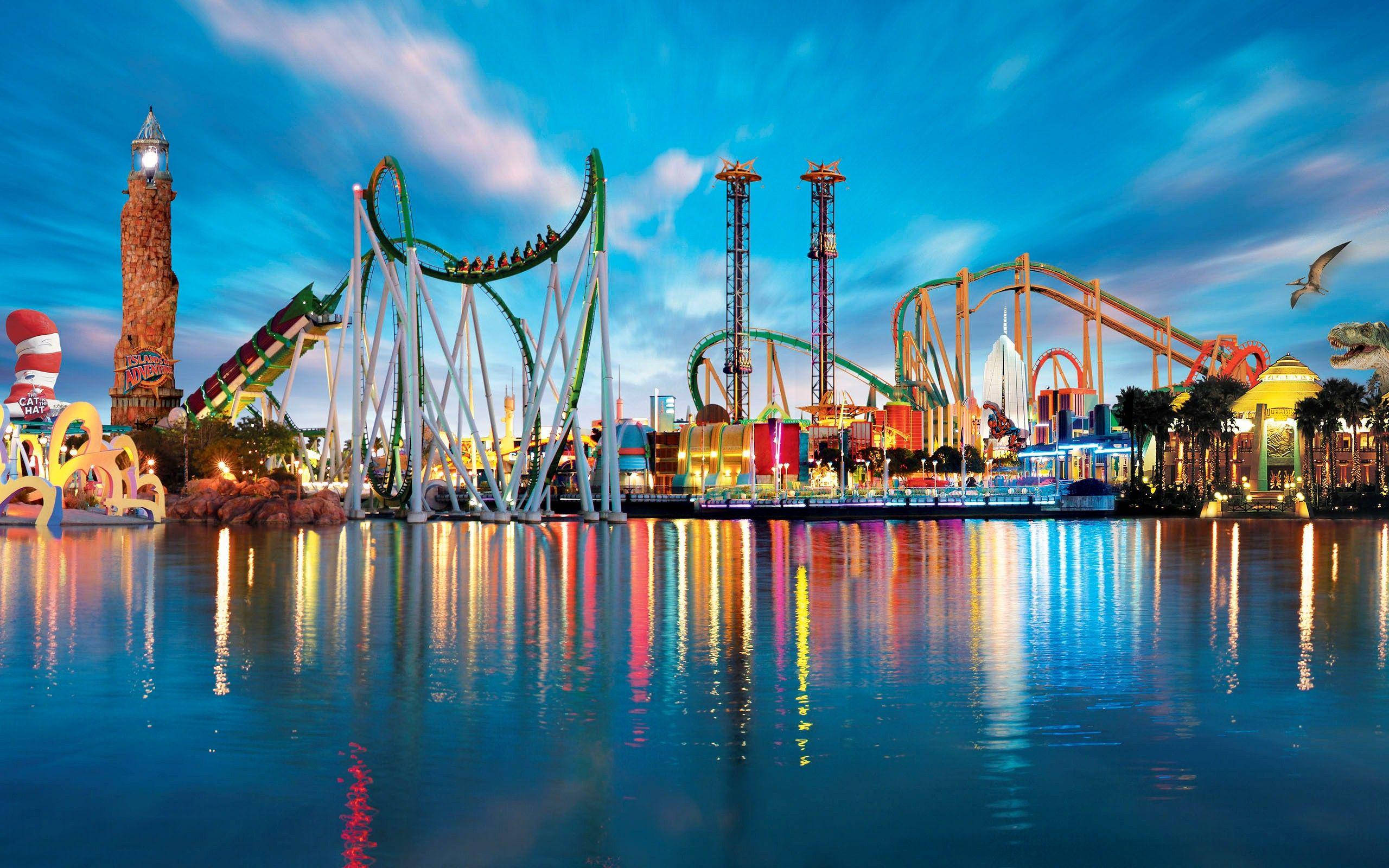 Colorful Theme Park Rides, twilight sky, calm water, 2K Desktop Wallpaper
