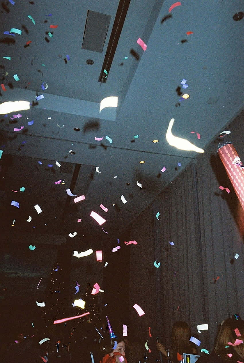 confetti celebration party scene, colorful confetti, dimly lit room, SD Phone Wallpaper