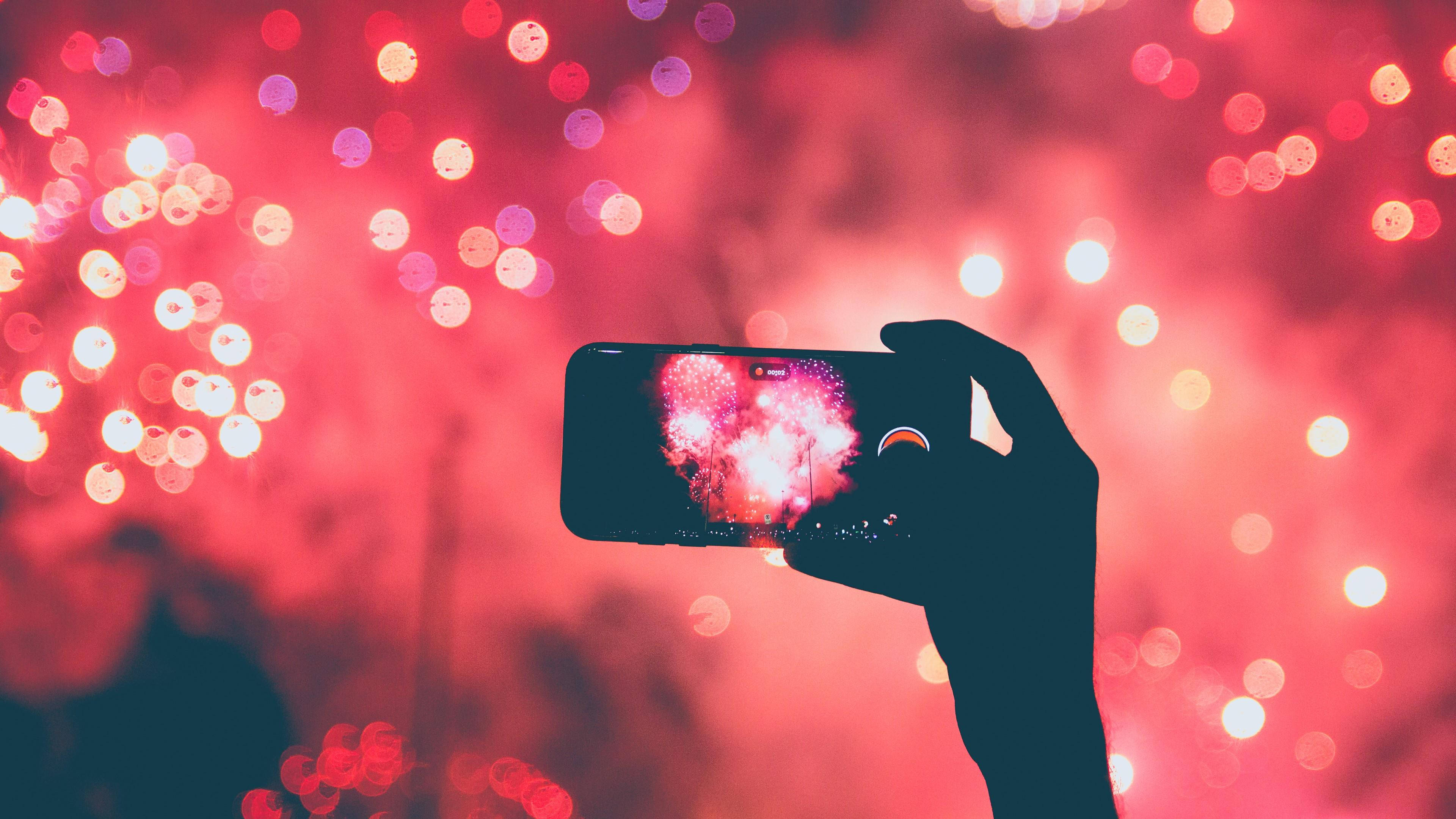 red fireworks, pink fireworks, bokeh-filled night sky, 4K Desktop Wallpaper
