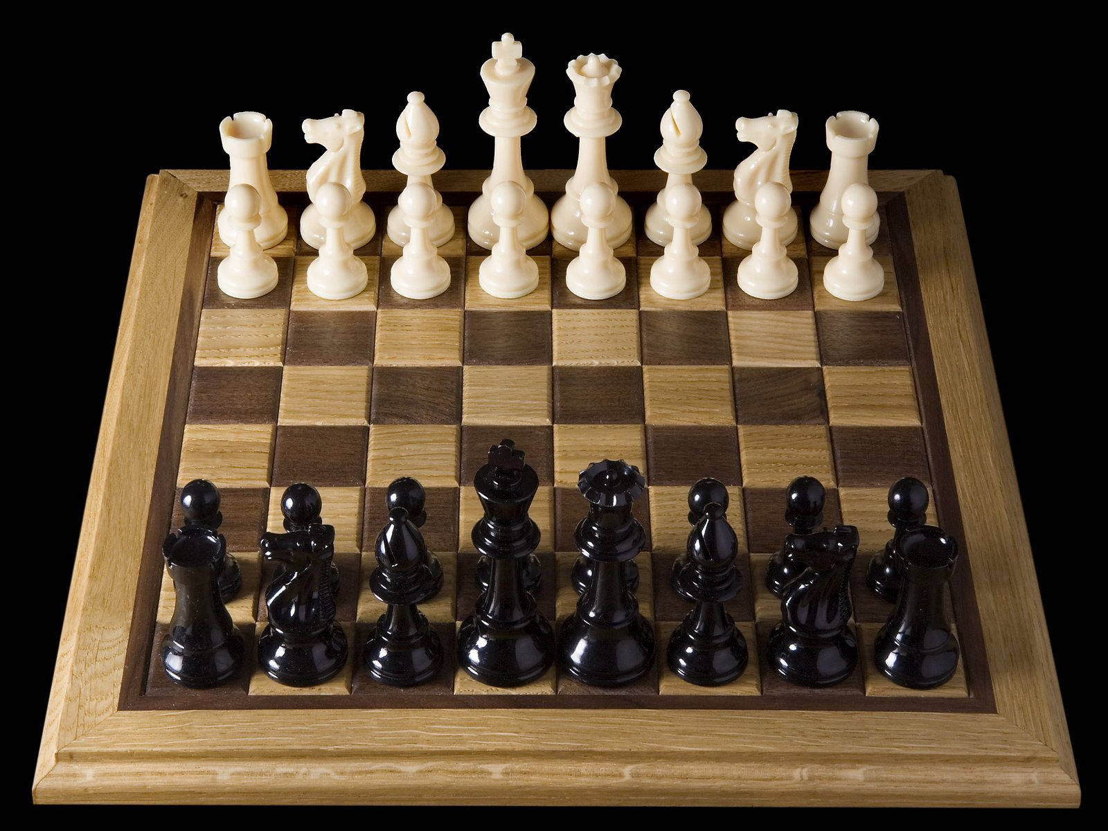 wooden chessboard, black and white pieces, stark black background, HD Desktop Wallpaper