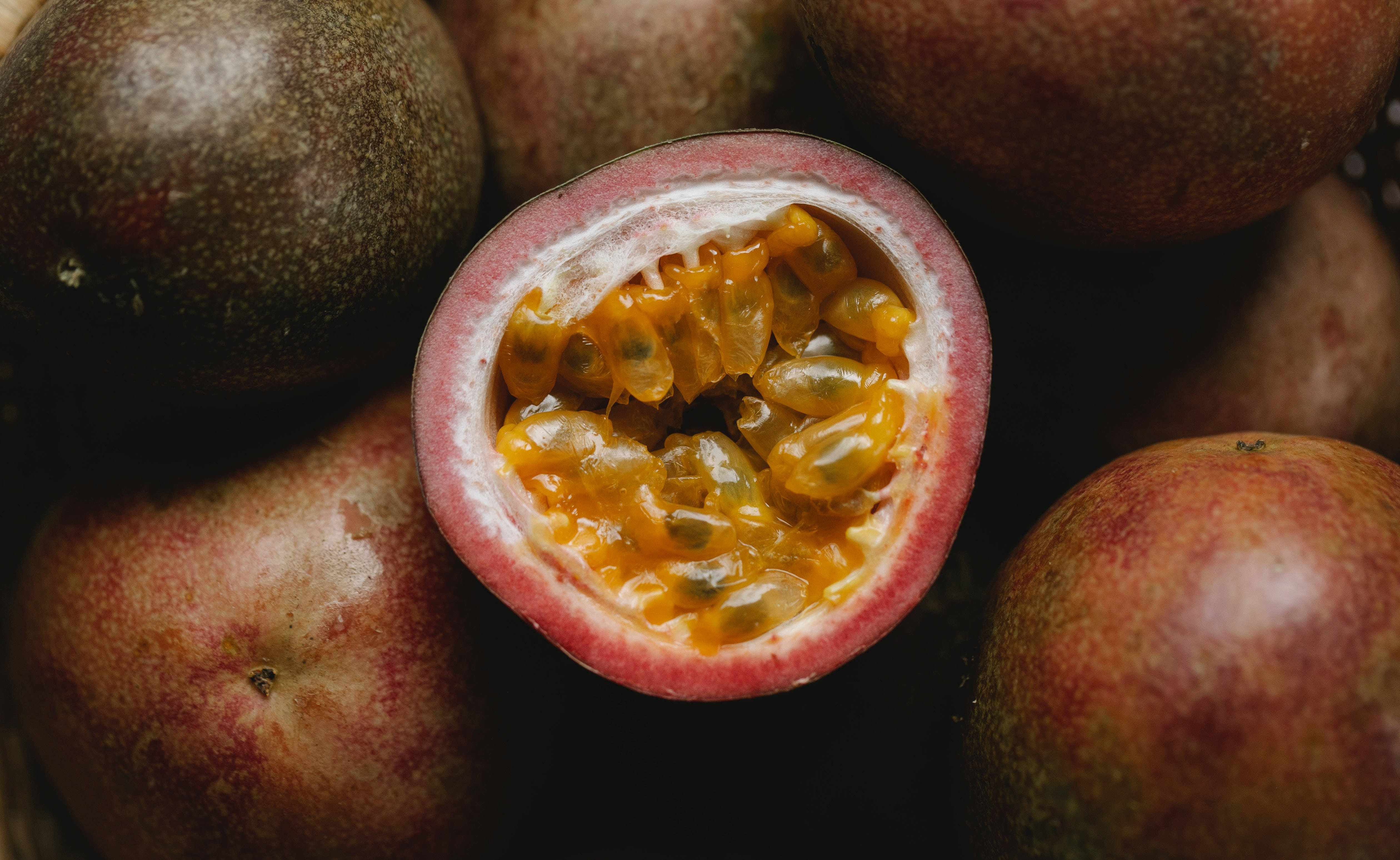 Passion Fruit, glistening orange pulp, seeds, 4K Desktop Wallpaper