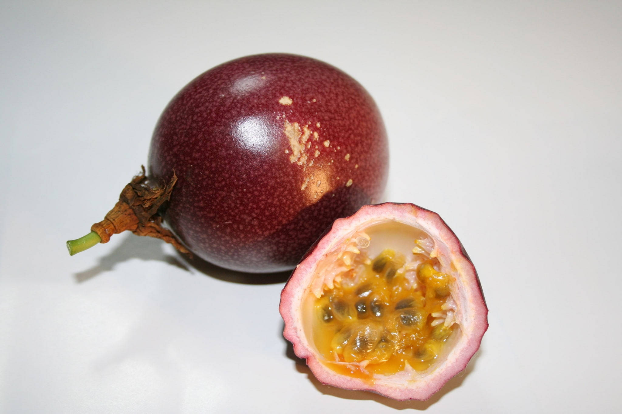 passion fruit, vibrant yellow pulp, black seeds, Full HD Desktop Wallpaper