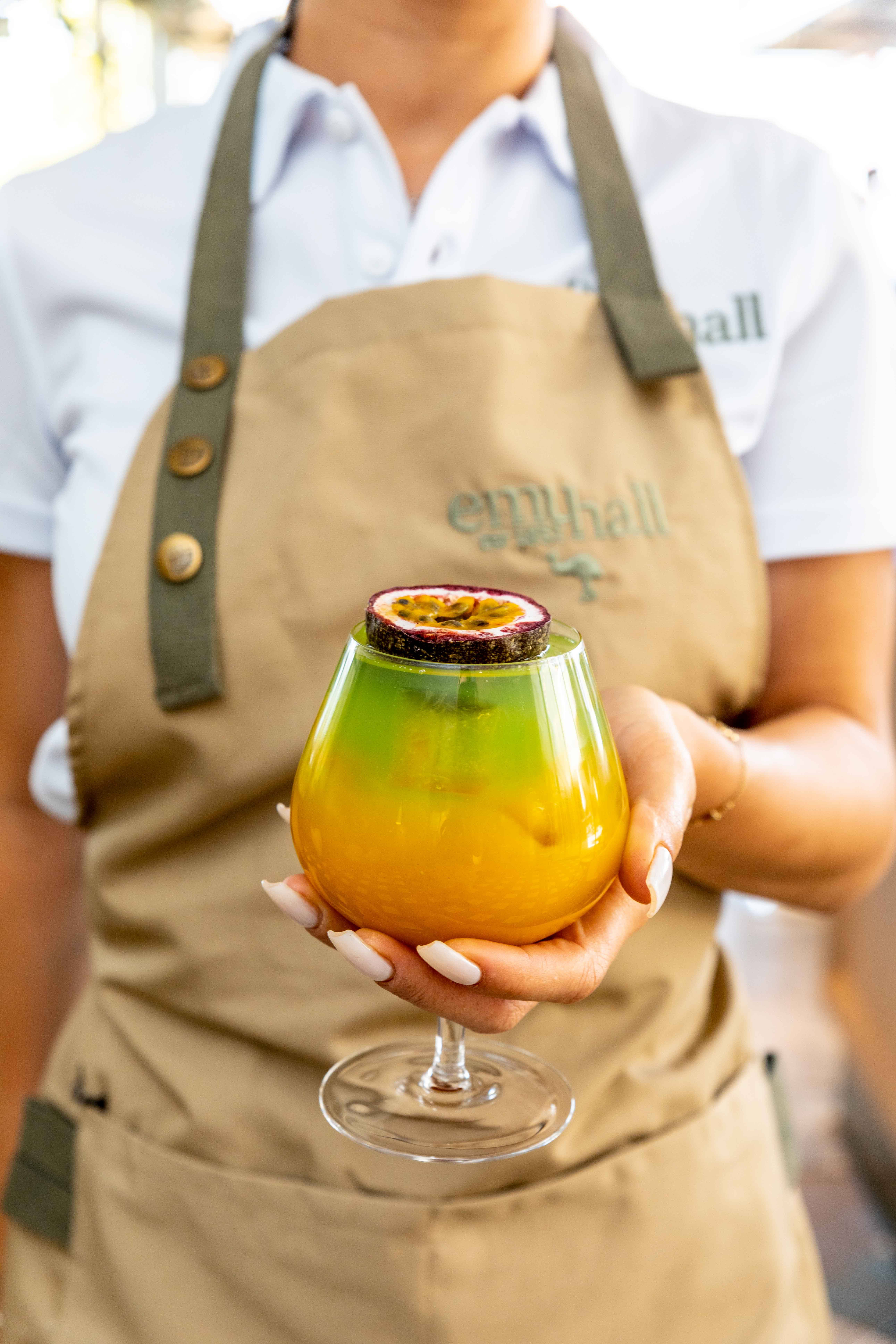 Tropical Cocktail With Passion Fruit, beige apron, vibrant gradient cocktail, 8K Phone Wallpaper