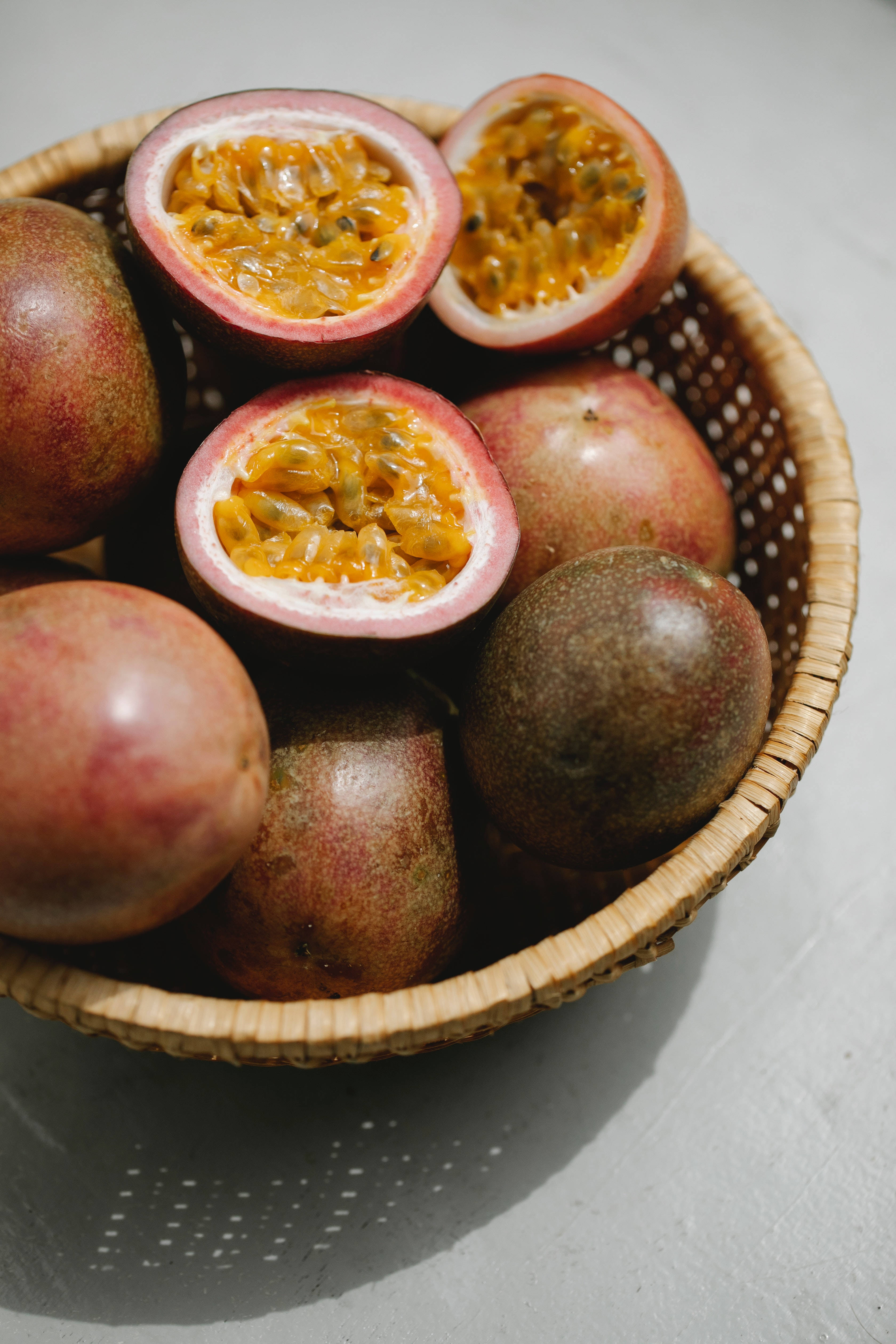 wicker bowl, passion fruit, orange pulp, 4K Phone Wallpaper
