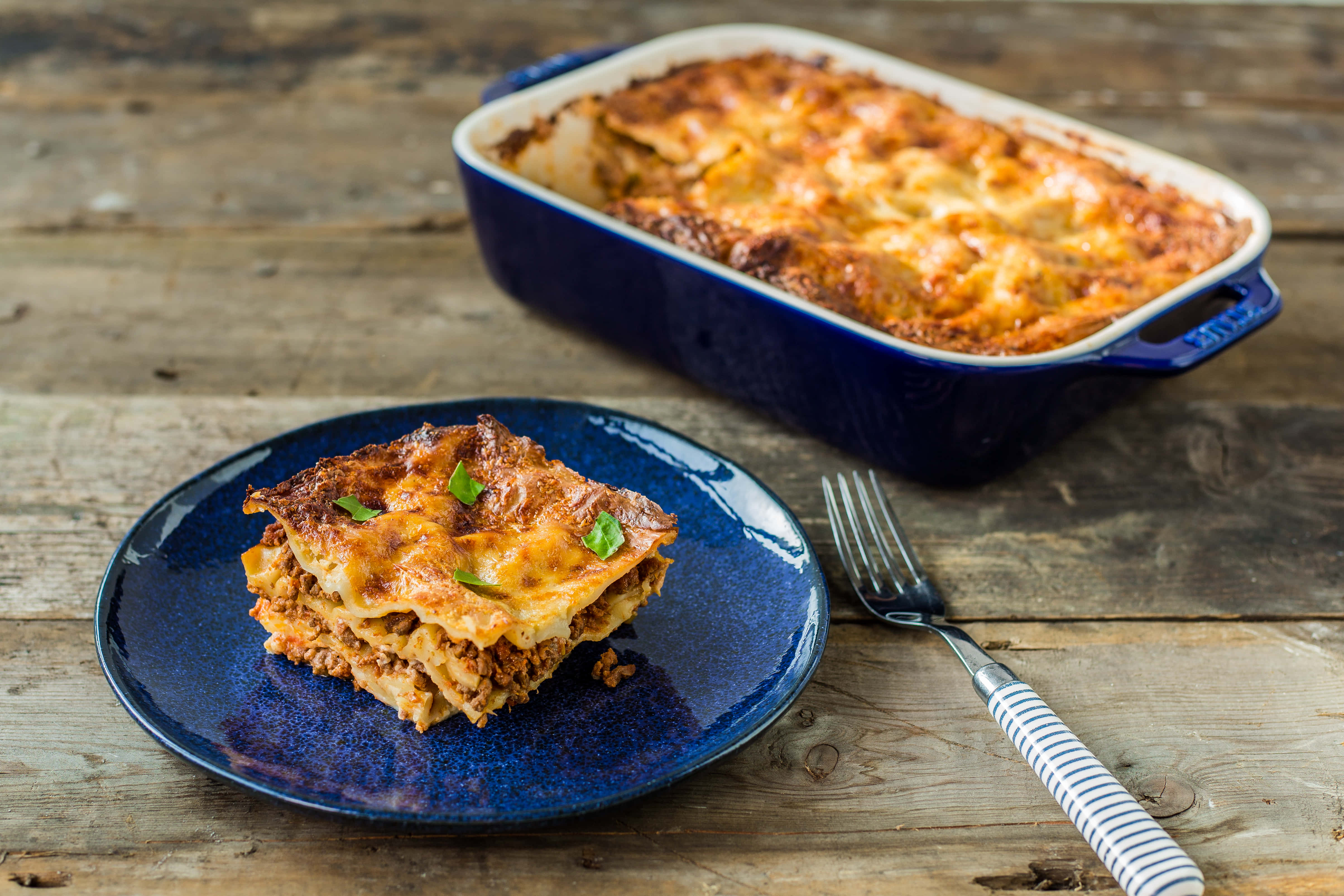 lasagna alla bolognese, golden-brown, fresh basil, 4K Desktop Wallpaper