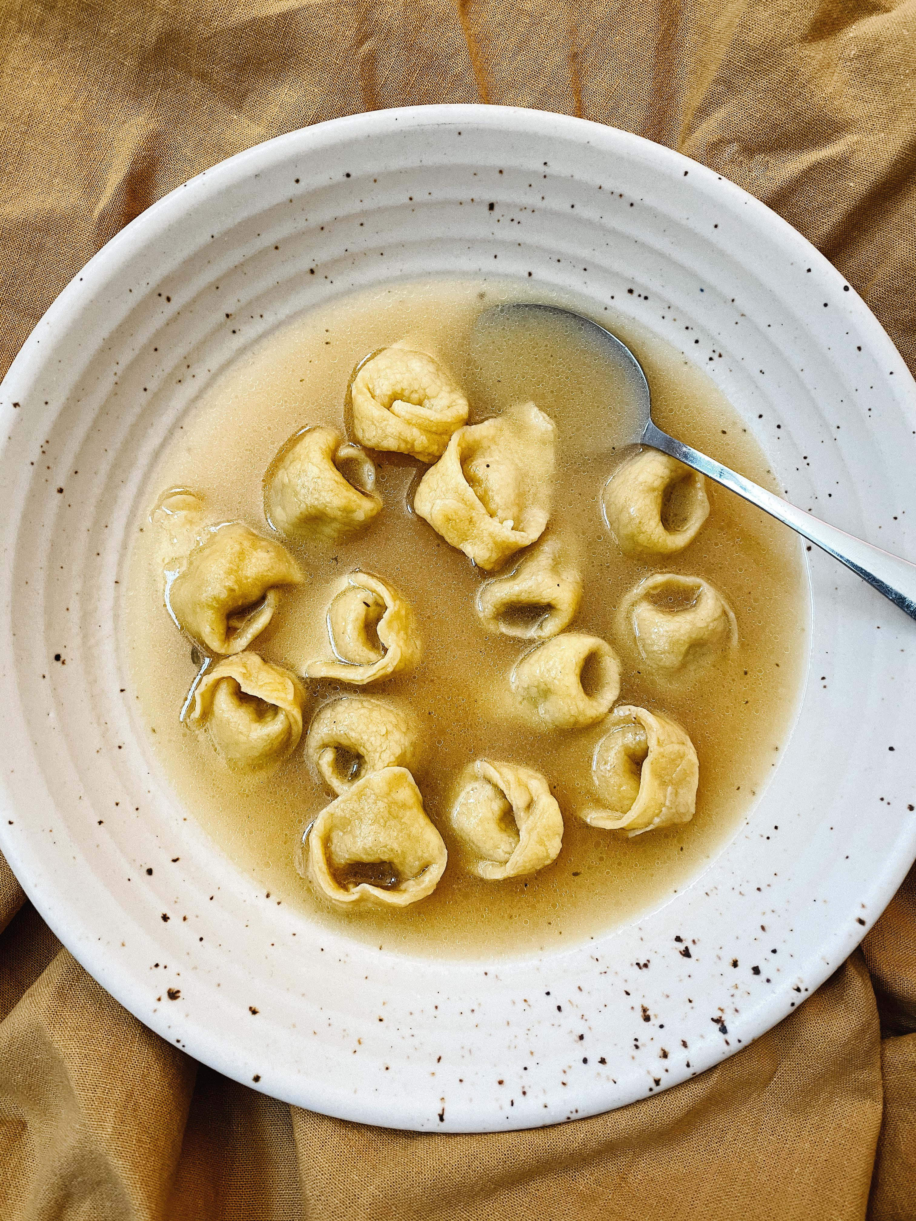 tortellini in brodo, golden tortellini, creamy broth, 4K Phone Wallpaper