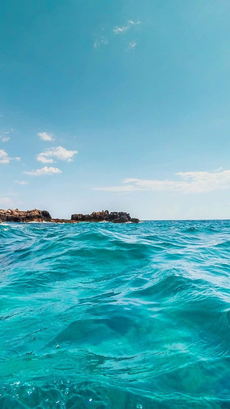 turquoise ocean waves, rocky cliffs, clear blue sky, HD Phone Wallpaper