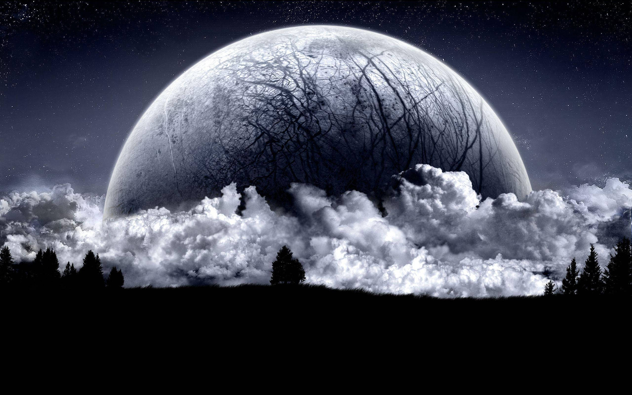 Moon, forest silhouette, swirling clouds, 2K Desktop Wallpaper