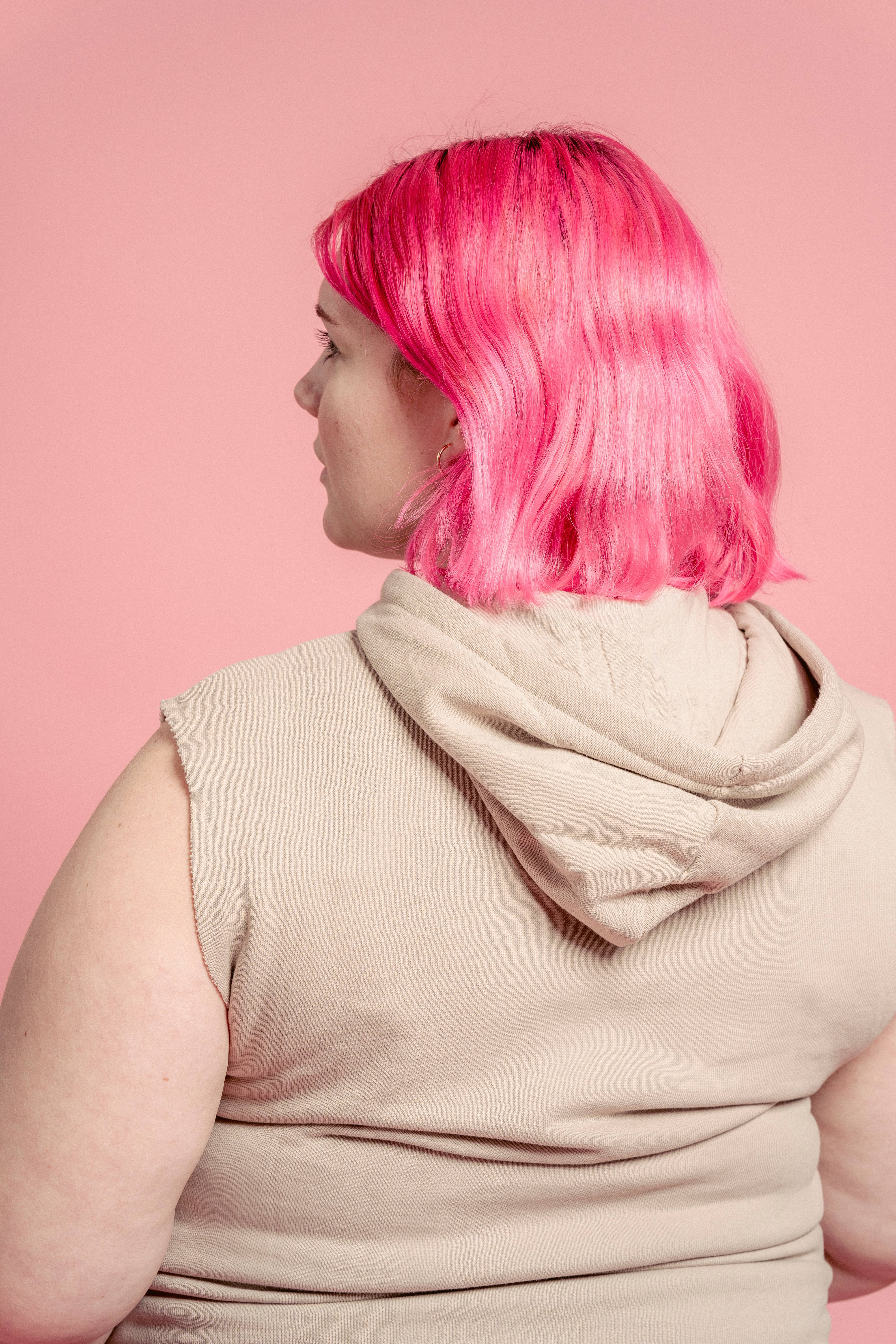 vibrant pink bob hair, soft pink studio backdrop, 5K Phone Wallpaper