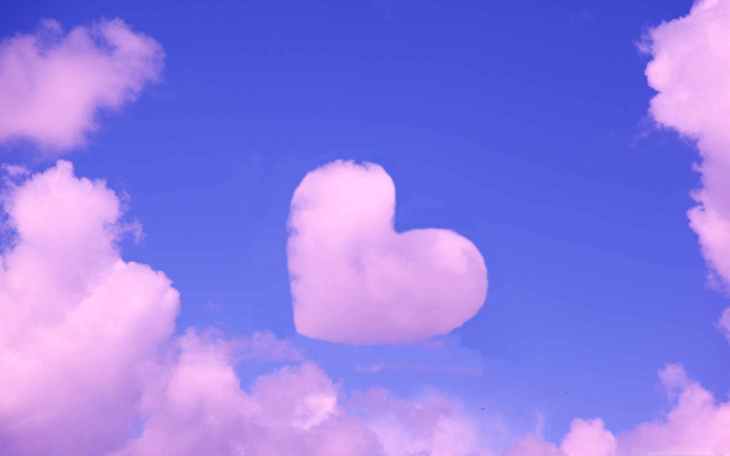 Pastel Pink Heart Cloud, soft pink heart-shaped cloud, vibrant blue sky, 2K Desktop Wallpaper