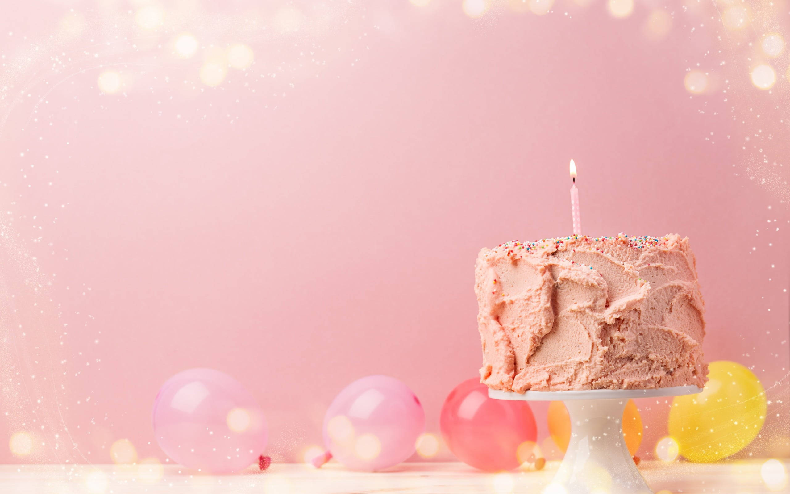 pastel pink background, pink frosted birthday cake, one candle, 2K Desktop Wallpaper