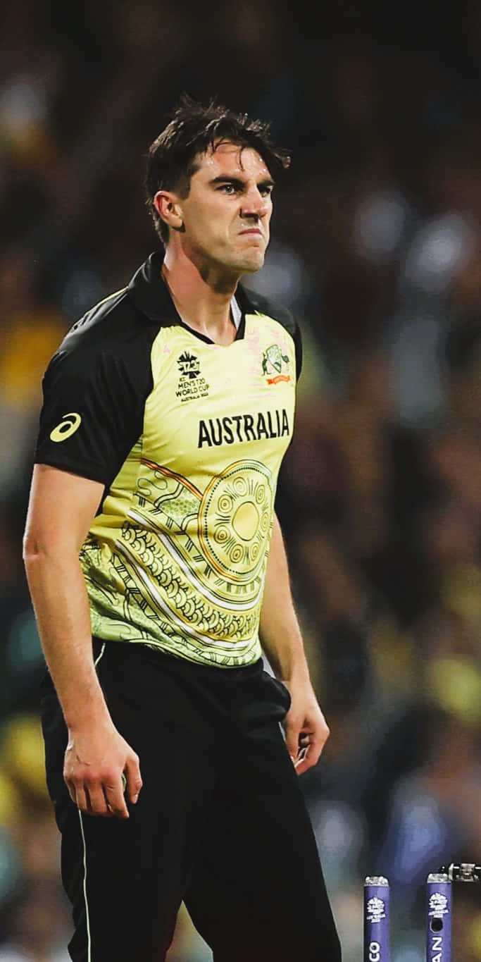 Pat Cummins, gold and black jersey, stadium field, HD Phone Wallpaper