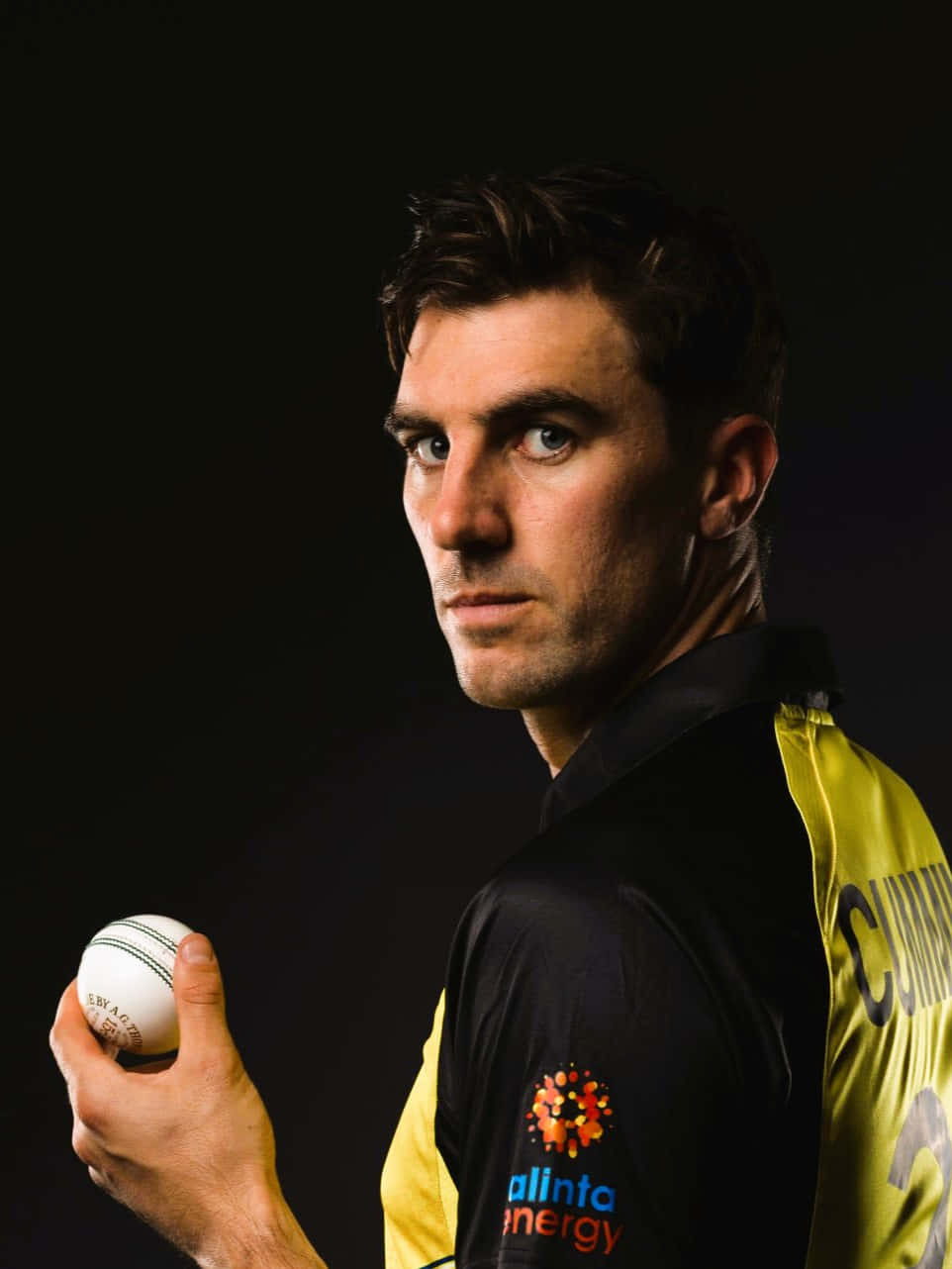 Pat Cummins, black and yellow jersey, white cricket ball, HD Phone Wallpaper