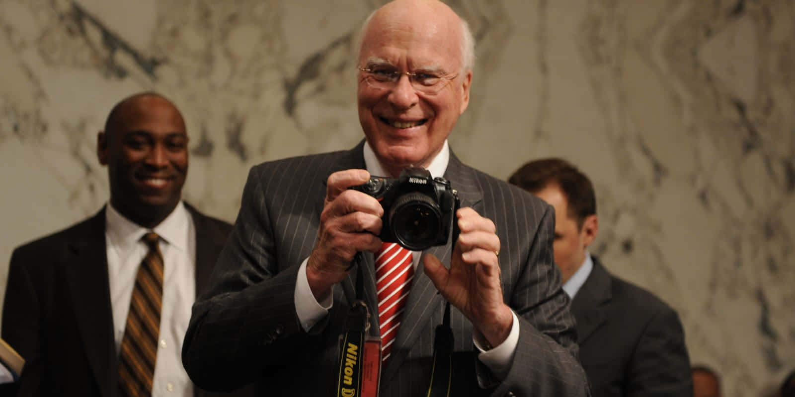 Patrick Leahy, Nikon DSLR camera, pinstripe suit, HD Desktop Wallpaper