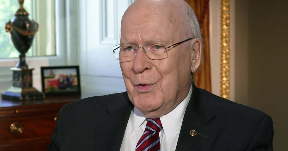Patrick Leahy, dark suit, red striped tie, SD Desktop Wallpaper